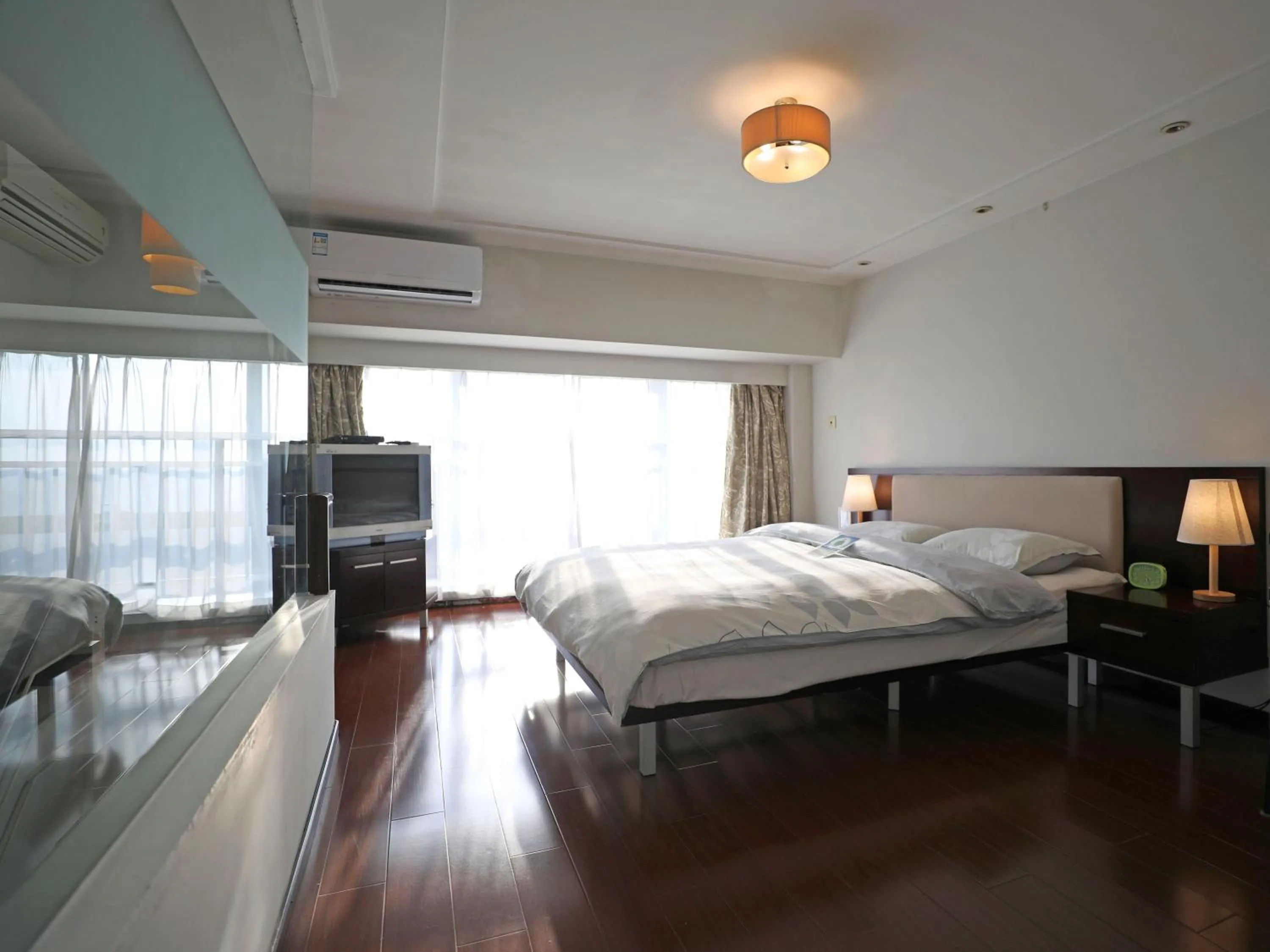 Bed in Shanghai Cosmo World Union Service Apartment