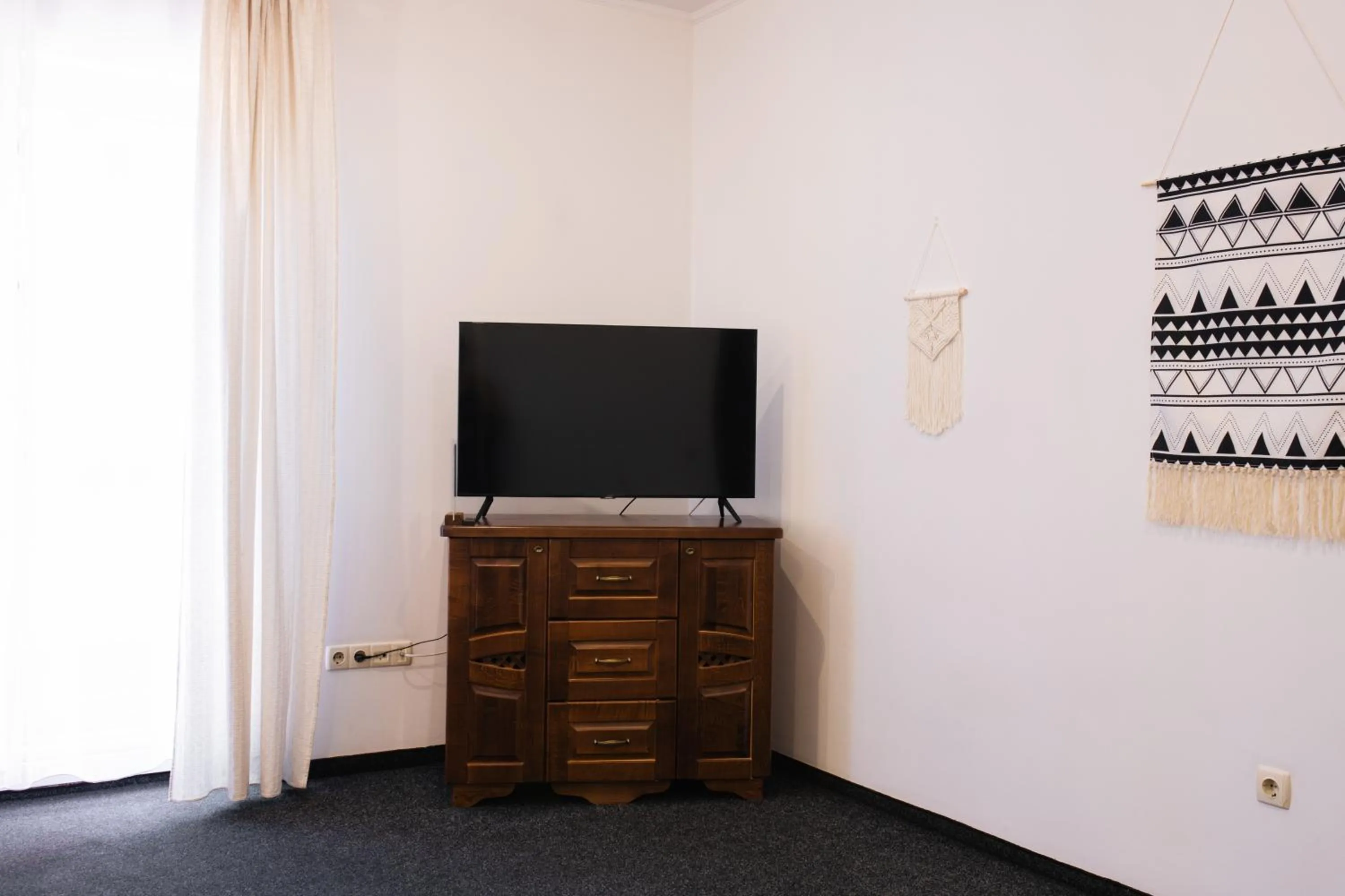 Communal lounge/ TV room in ZimaSnow Ski & Spa Club