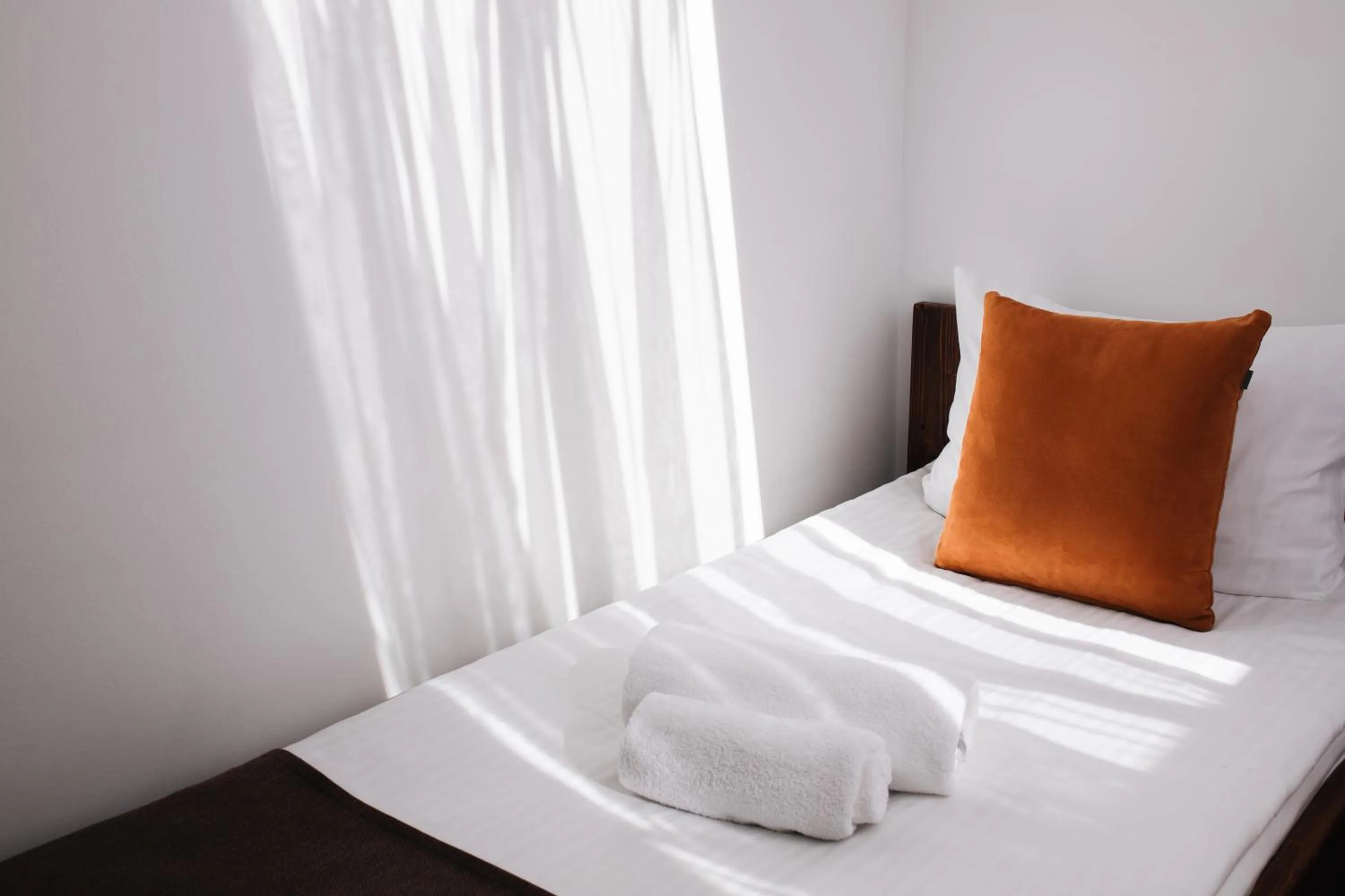 Bed in ZimaSnow Ski & Spa Club