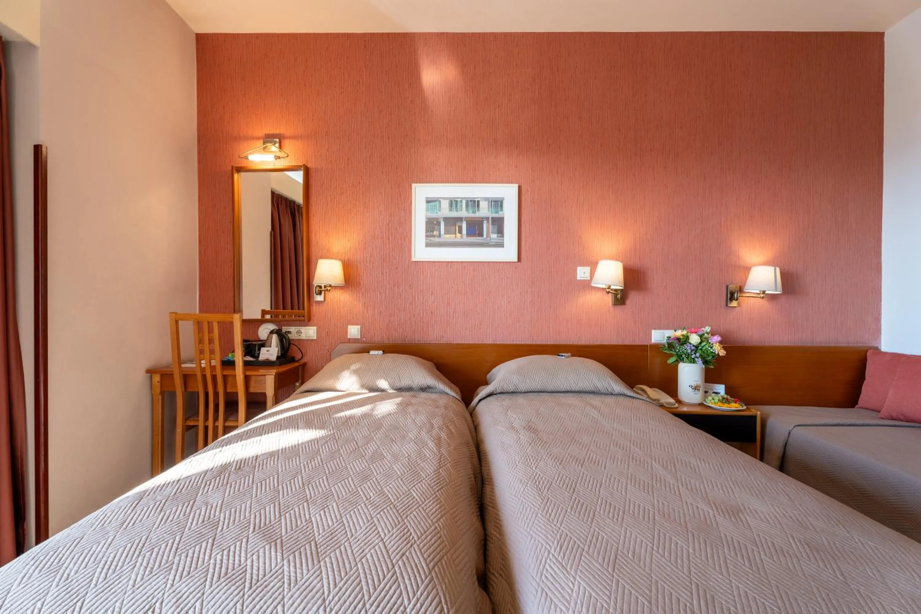 Bed in Queen Olga Hotel