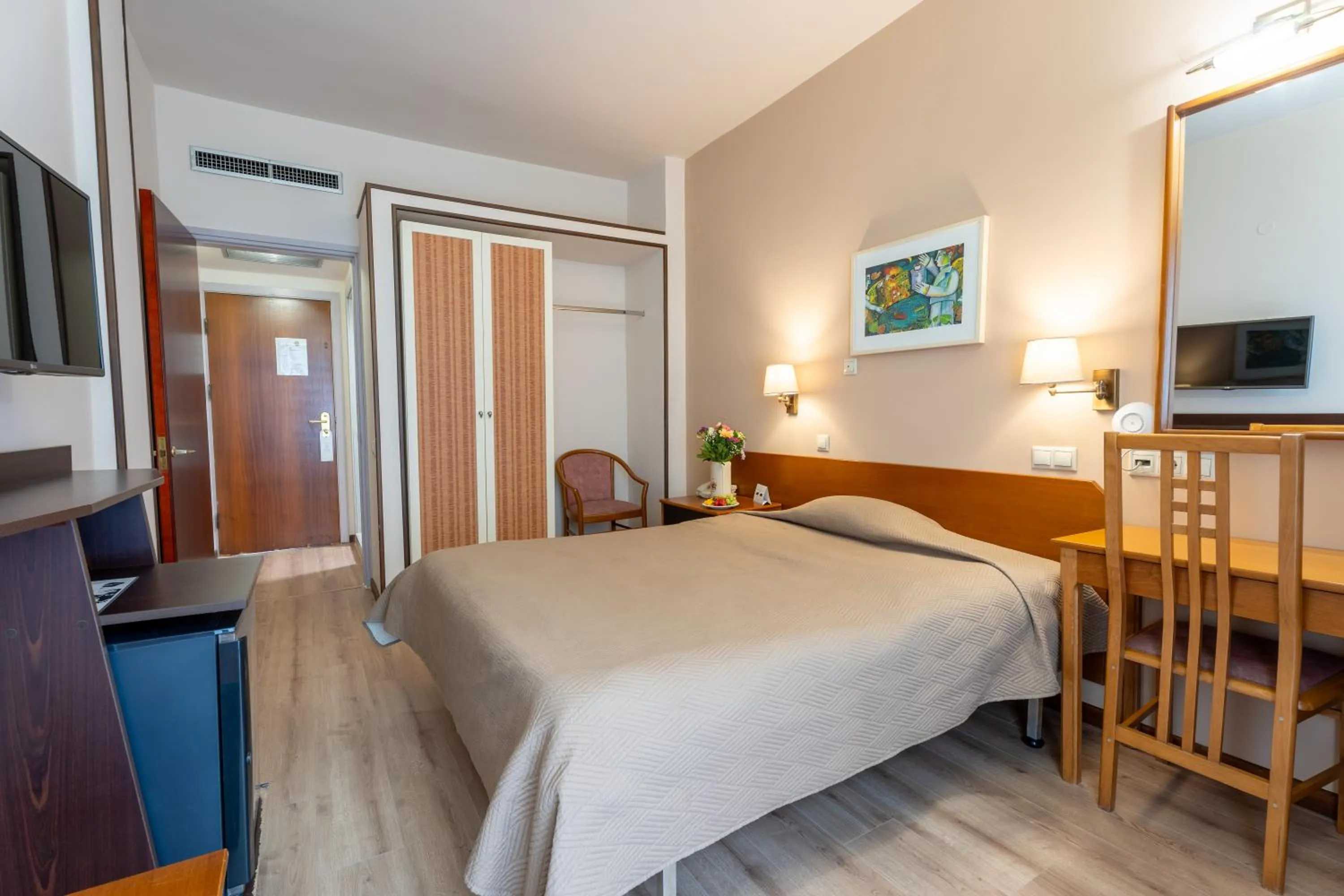 Bed in Queen Olga Hotel