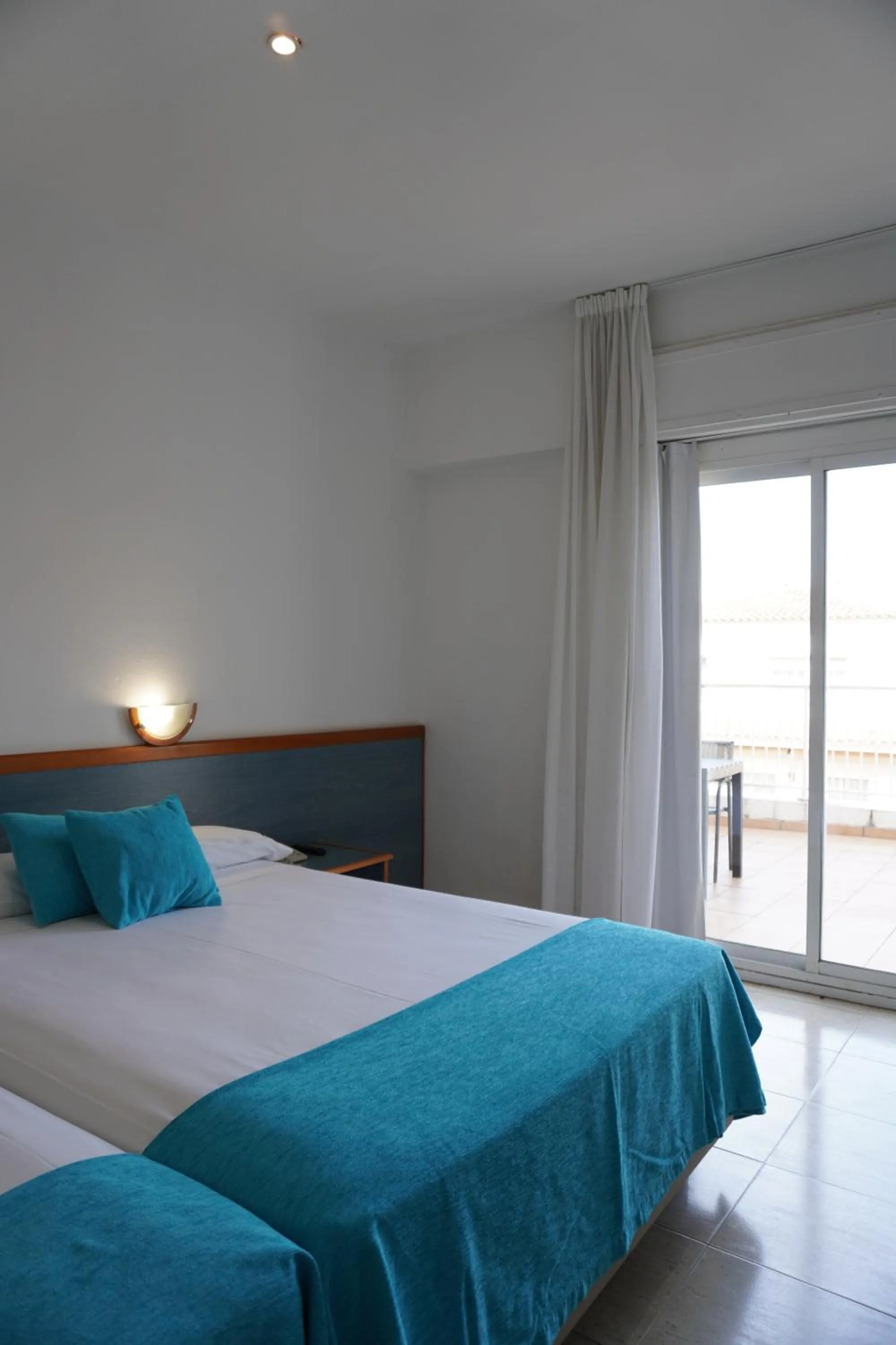 Bed in Hotel Brisamar Suites