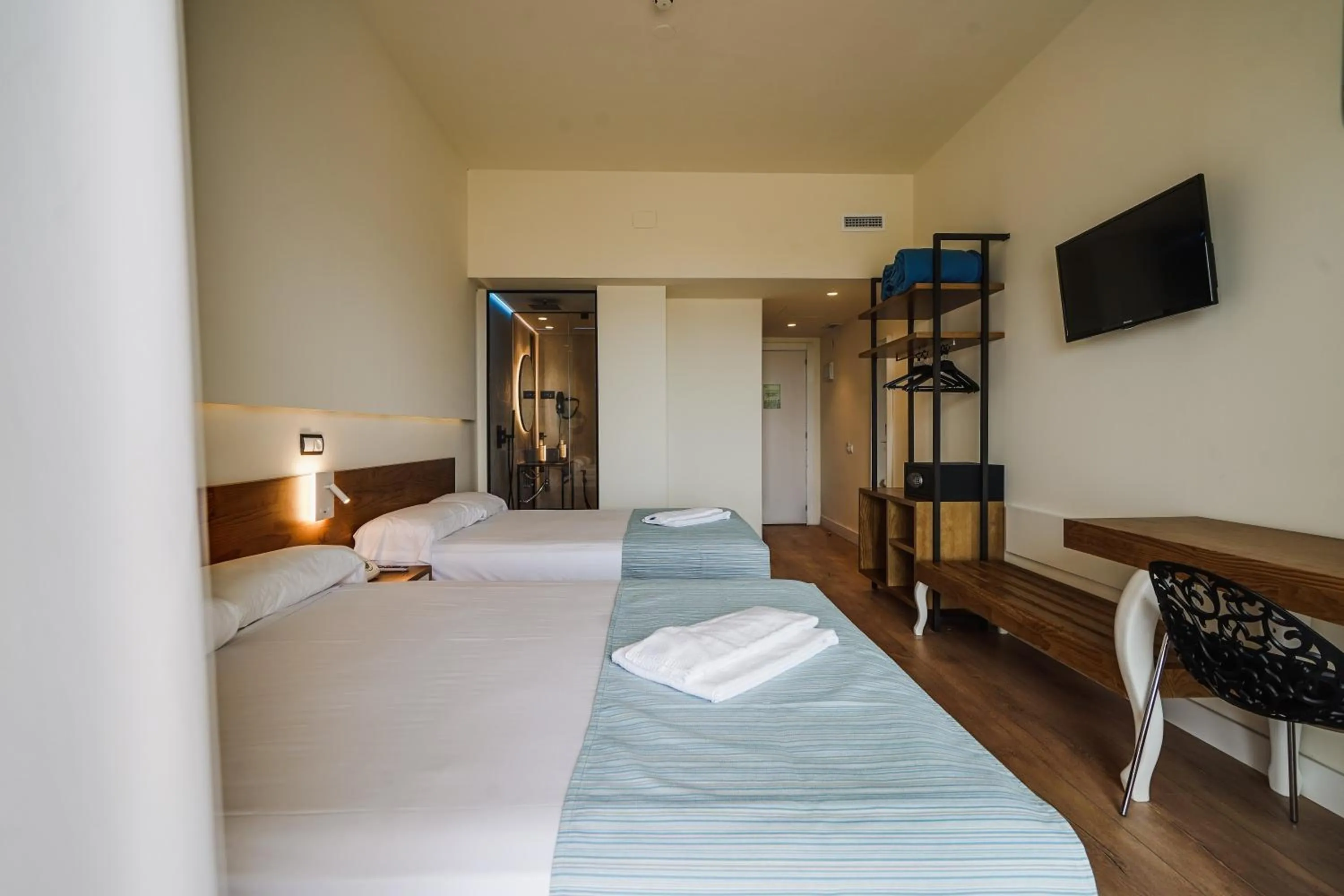 Bed in Hotel Brisamar Suites