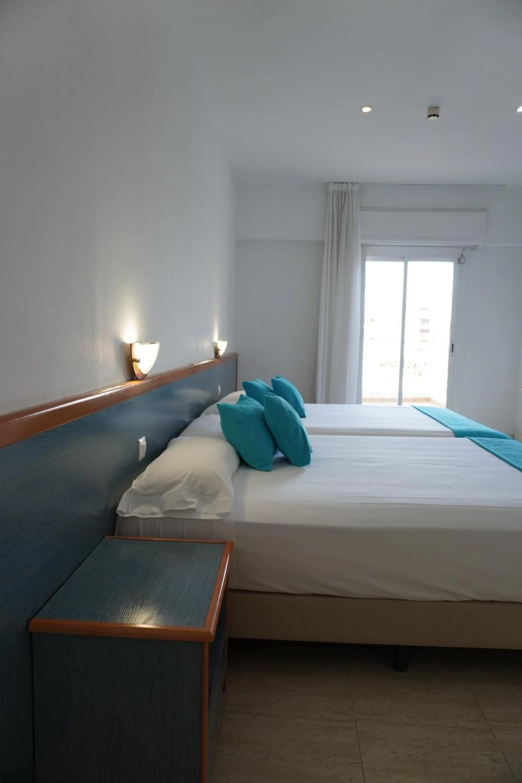 Bed in Hotel Brisamar Suites