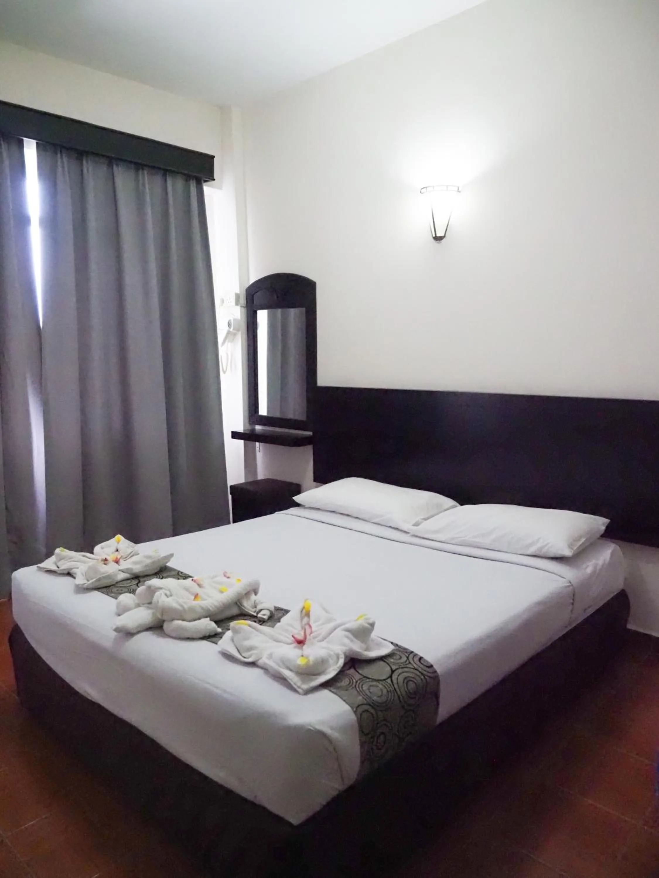 Bed in Glory Beach Resort