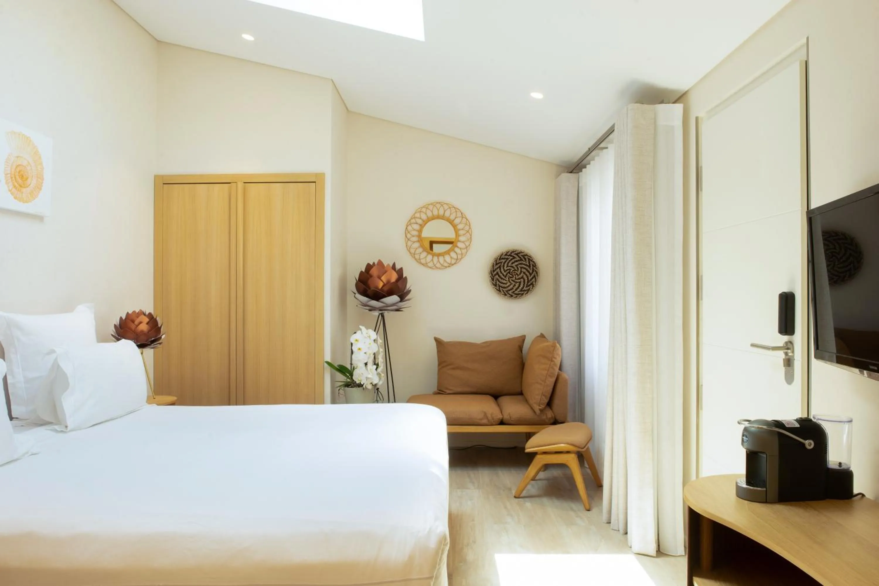 Communal lounge/ TV room in Boutique Hôtel Villa Fabulite