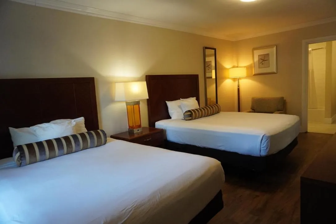 Bed in Rose Garden Inn