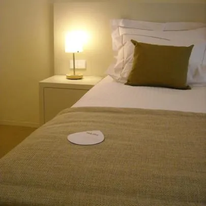 Bed in INLIMA Hotel & Spa