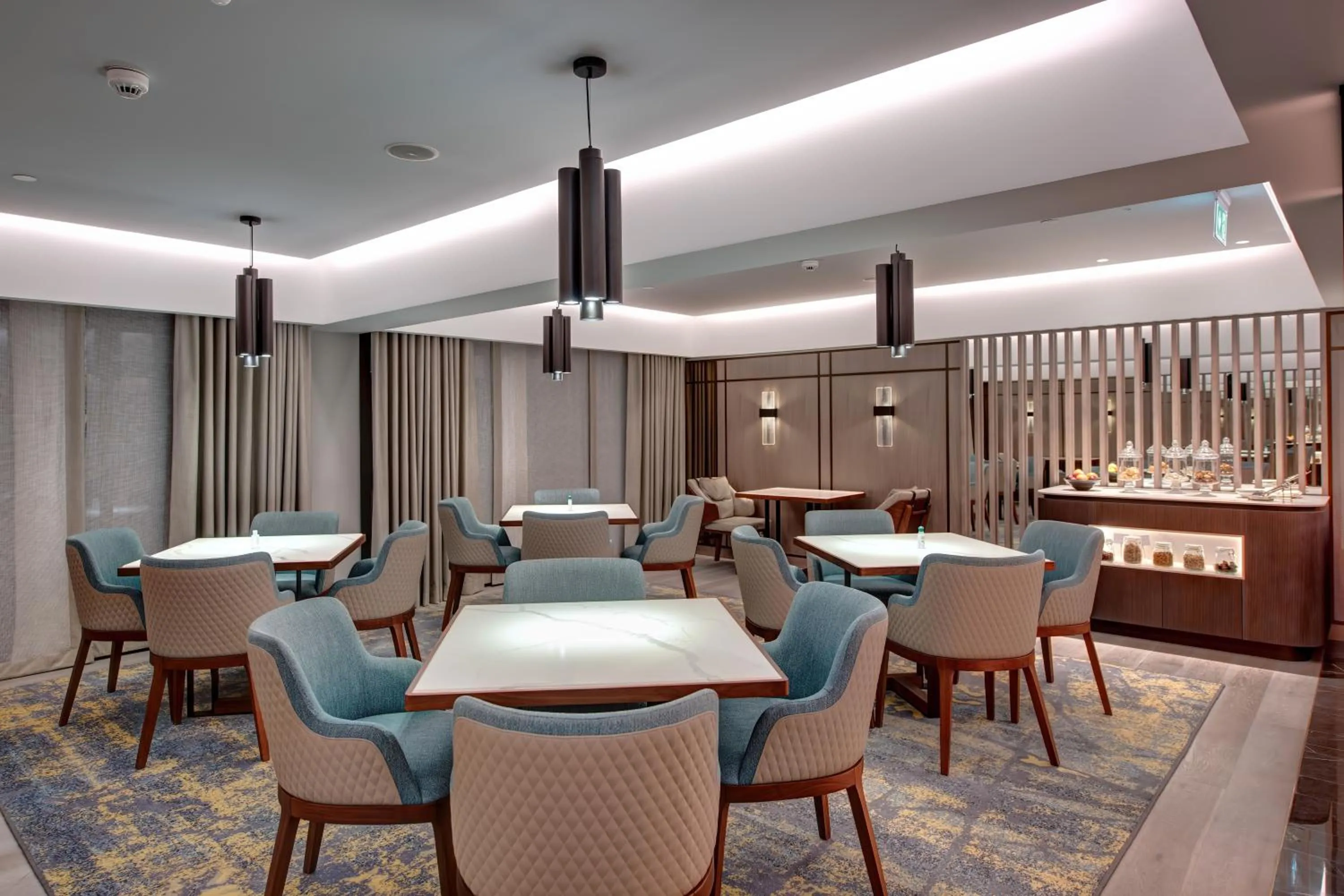 Lounge or bar in InterContinental Muscat by IHG