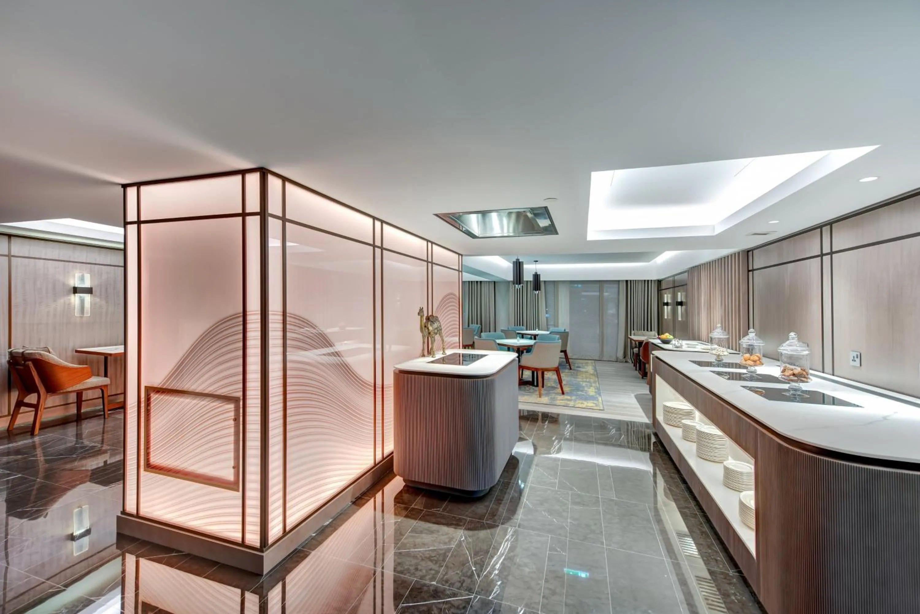 Lounge or bar in InterContinental Muscat by IHG