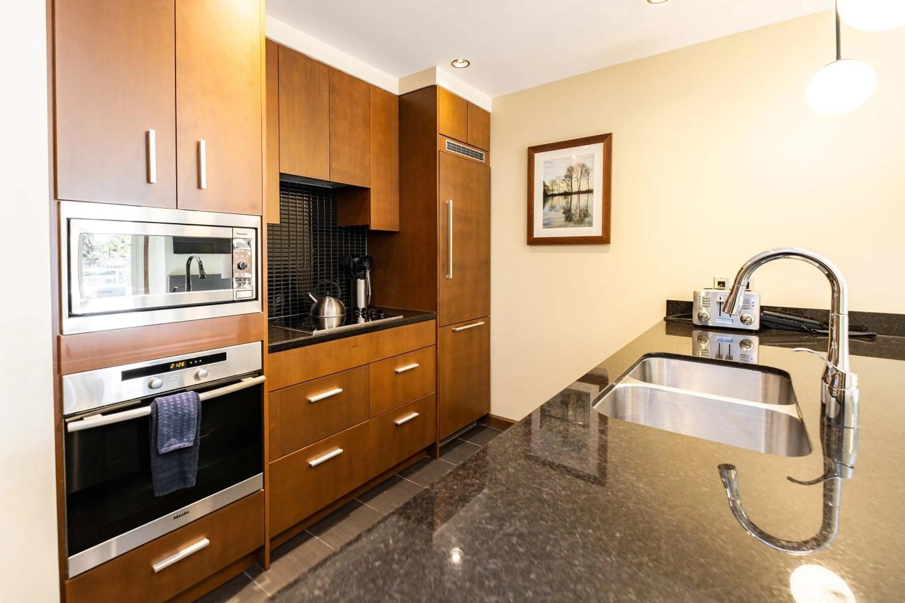 Kitchen or kitchenette in Sutton Place Hotel Revelstoke Mountain Resort