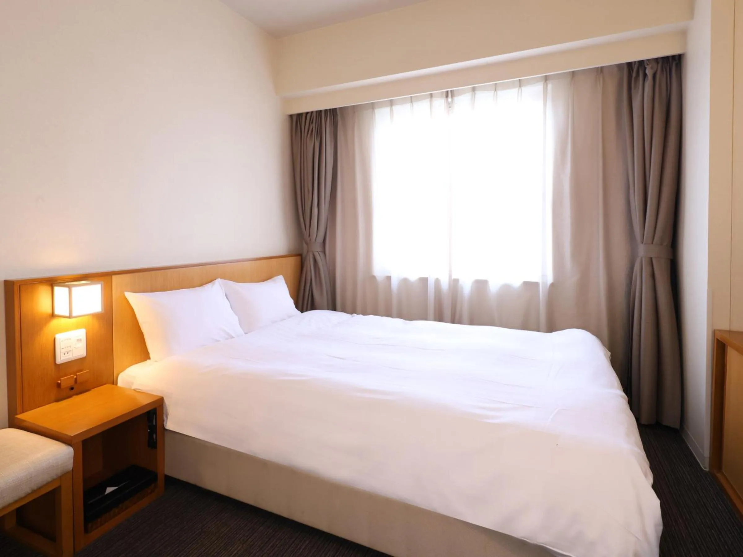 Photo of the whole room, Bed in Dormy Inn Tsu