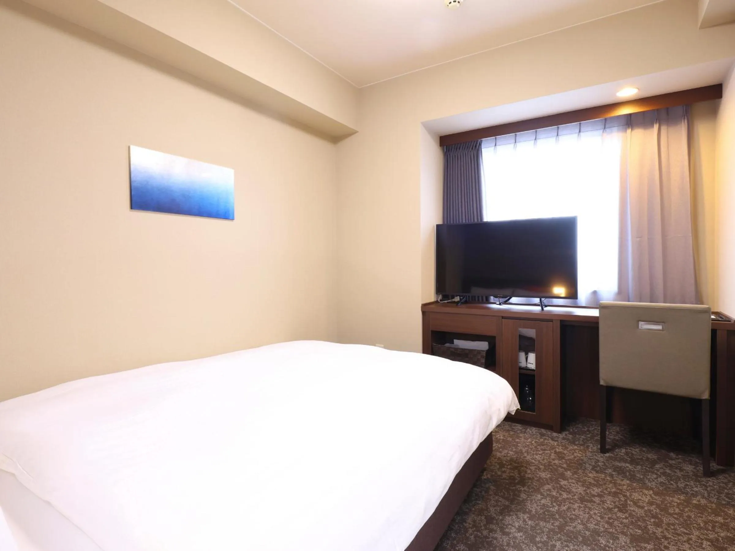 Photo of the whole room, Bed in Tennen Onsen Taho-no-Yu Dormy Inn Niigata