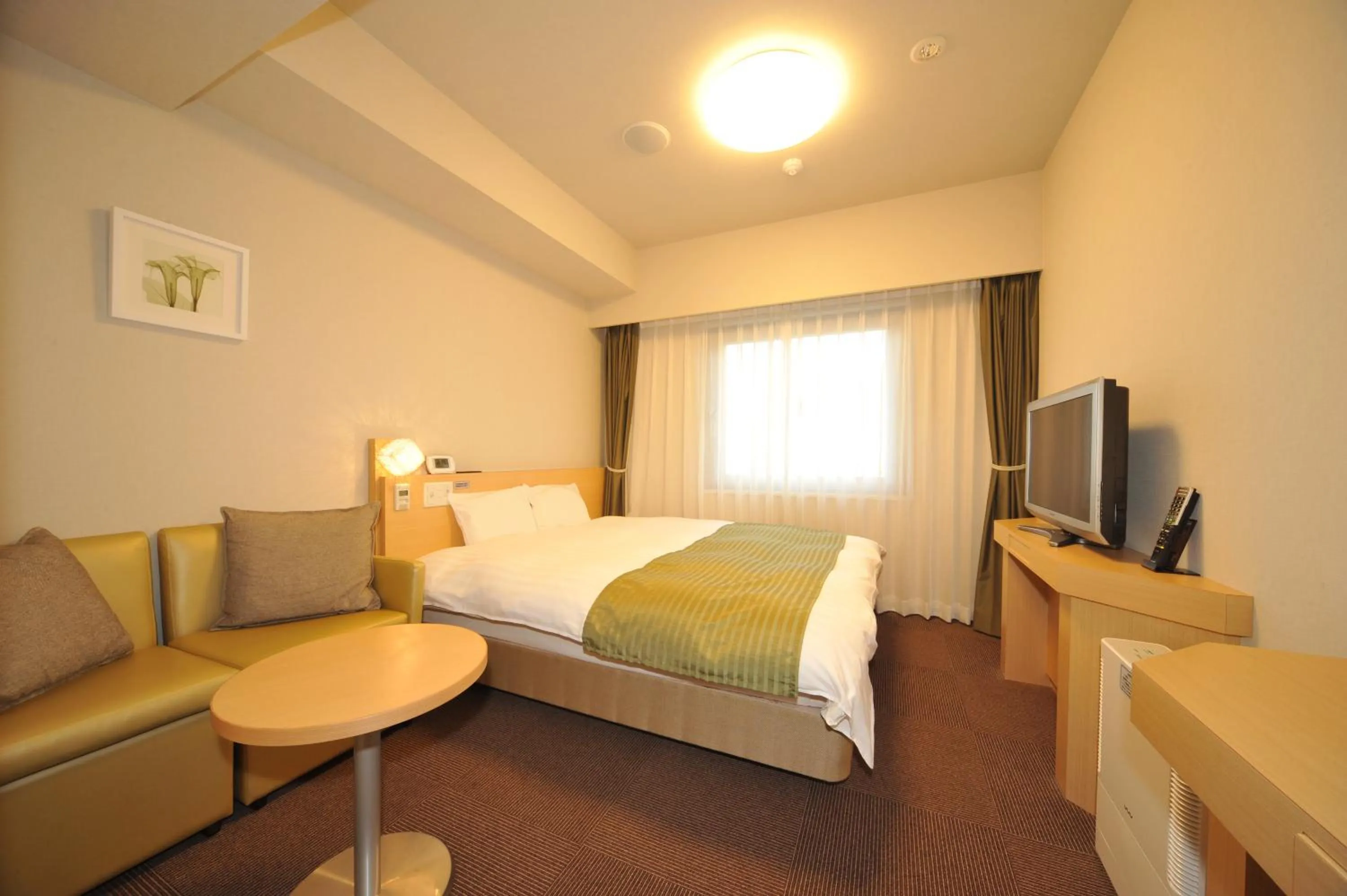 Living room, Bed in Dormy Inn Obihiro