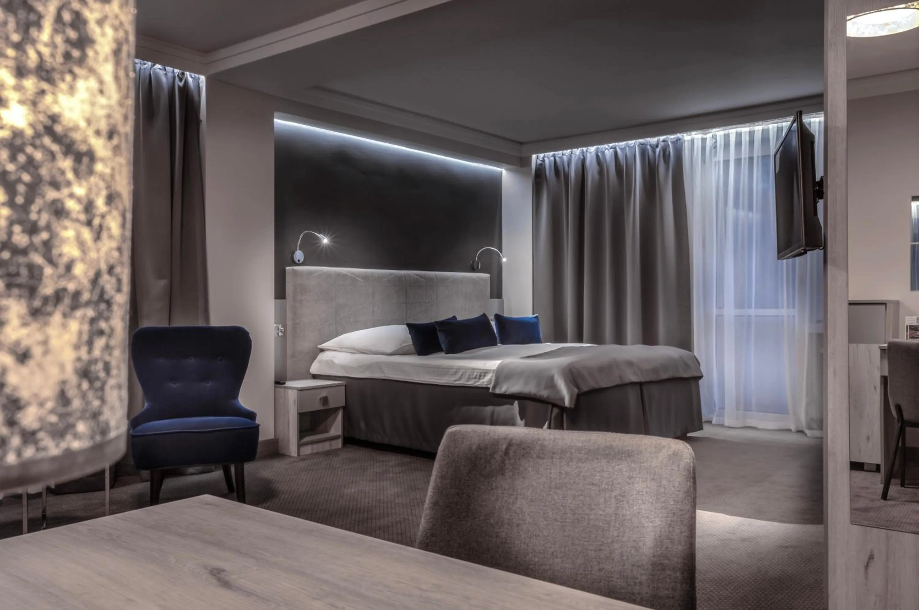 Living room, Bed in Hotel Cristal Park