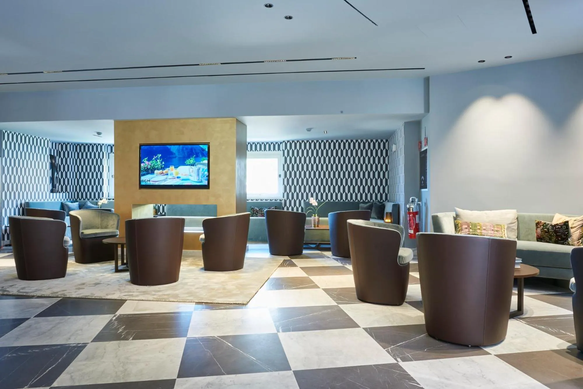 Communal lounge/ TV room in Hotel Michelangelo