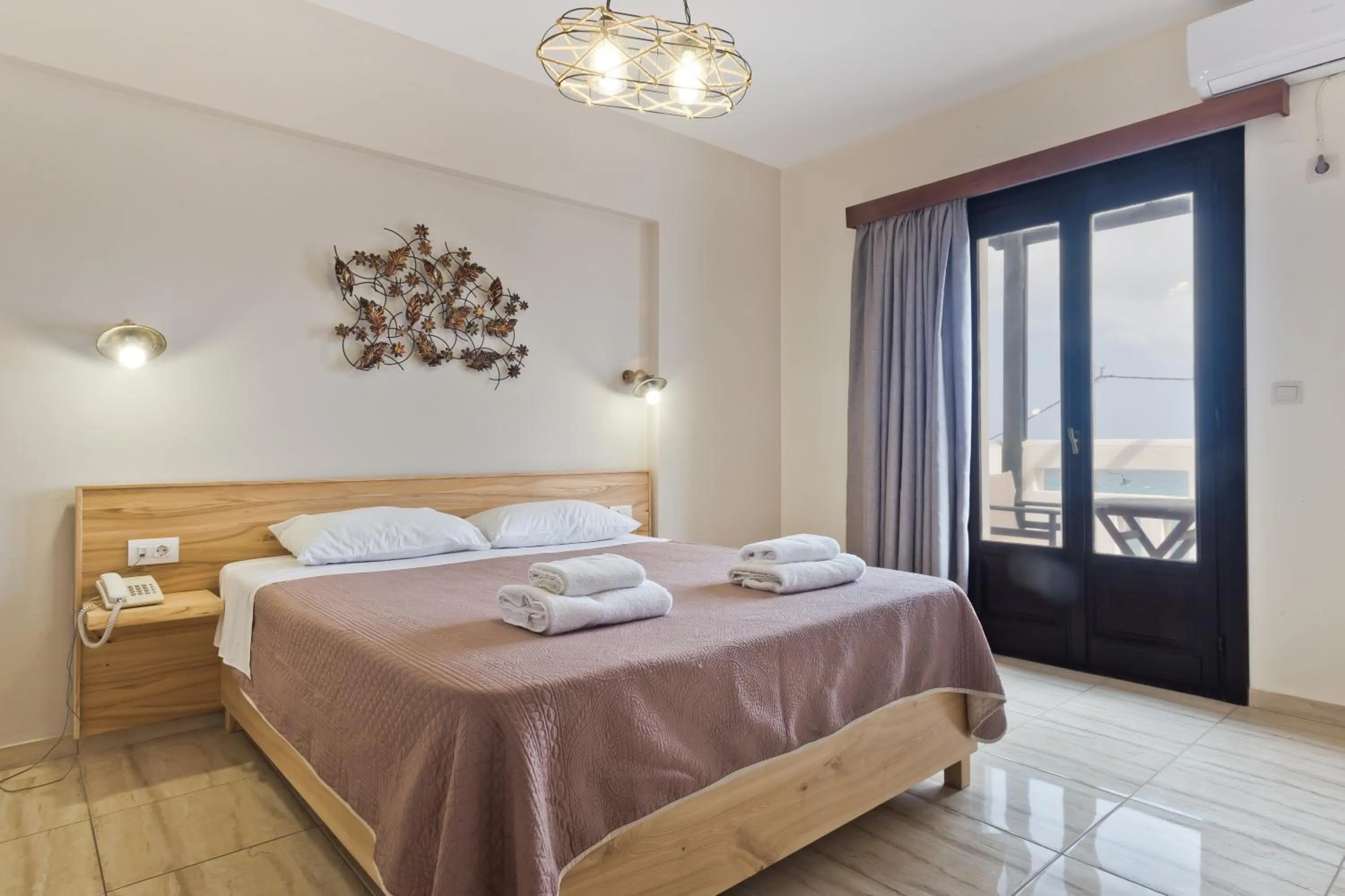 Bed in Arkasa Bay Hotel