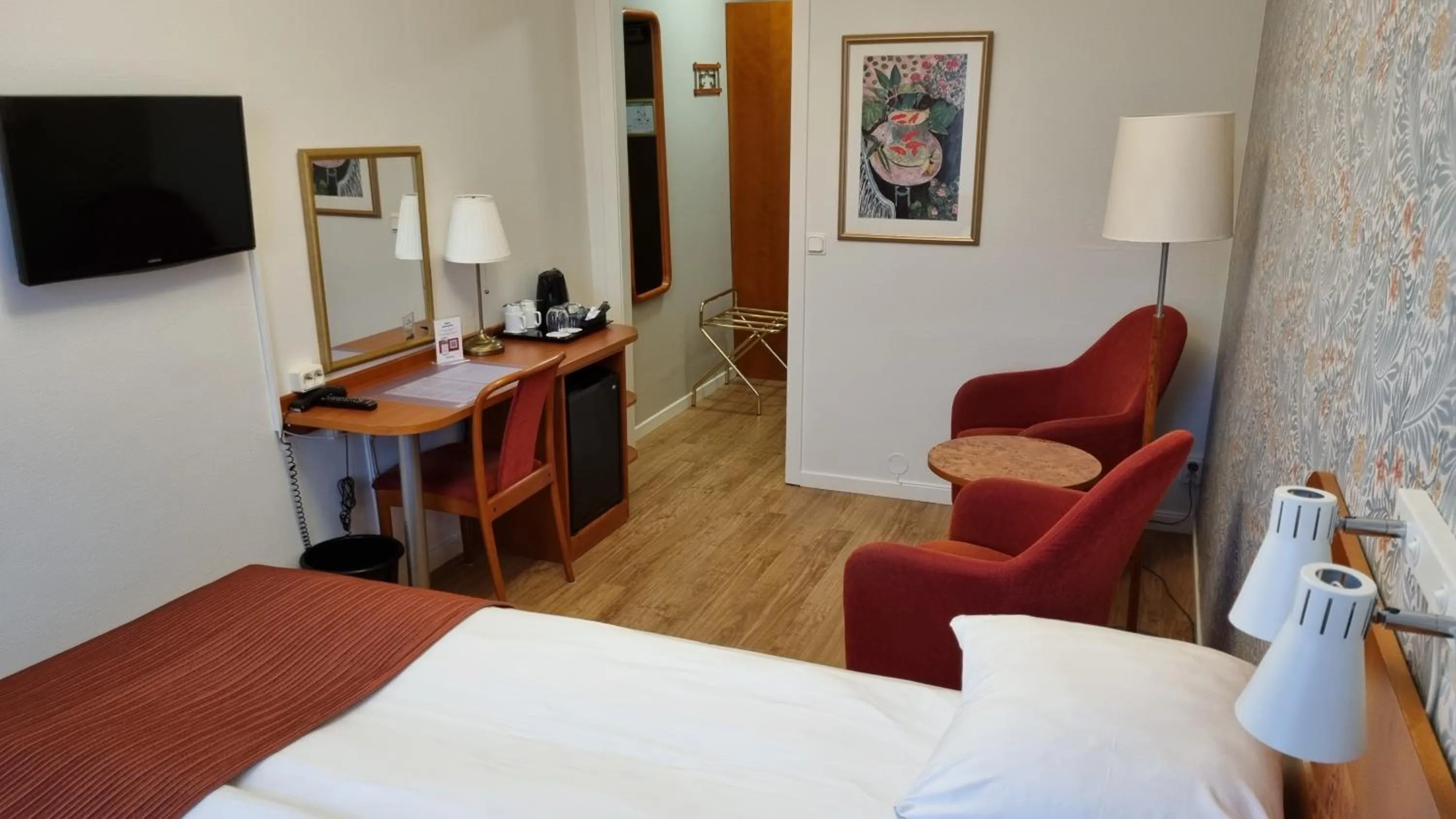 Seating area, Bed in Hotel Lorensberg