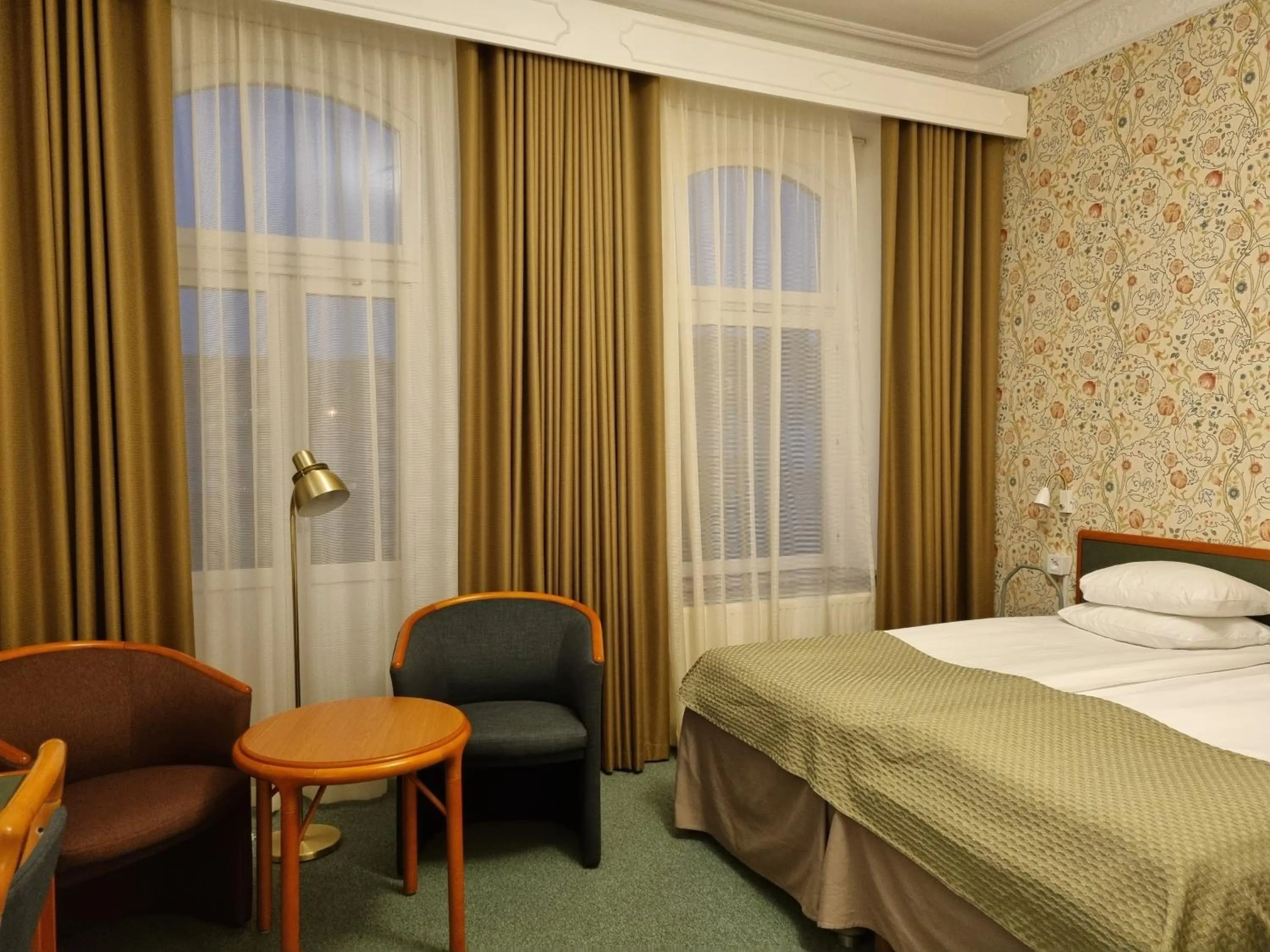 Seating area, Bed in Hotel Lorensberg