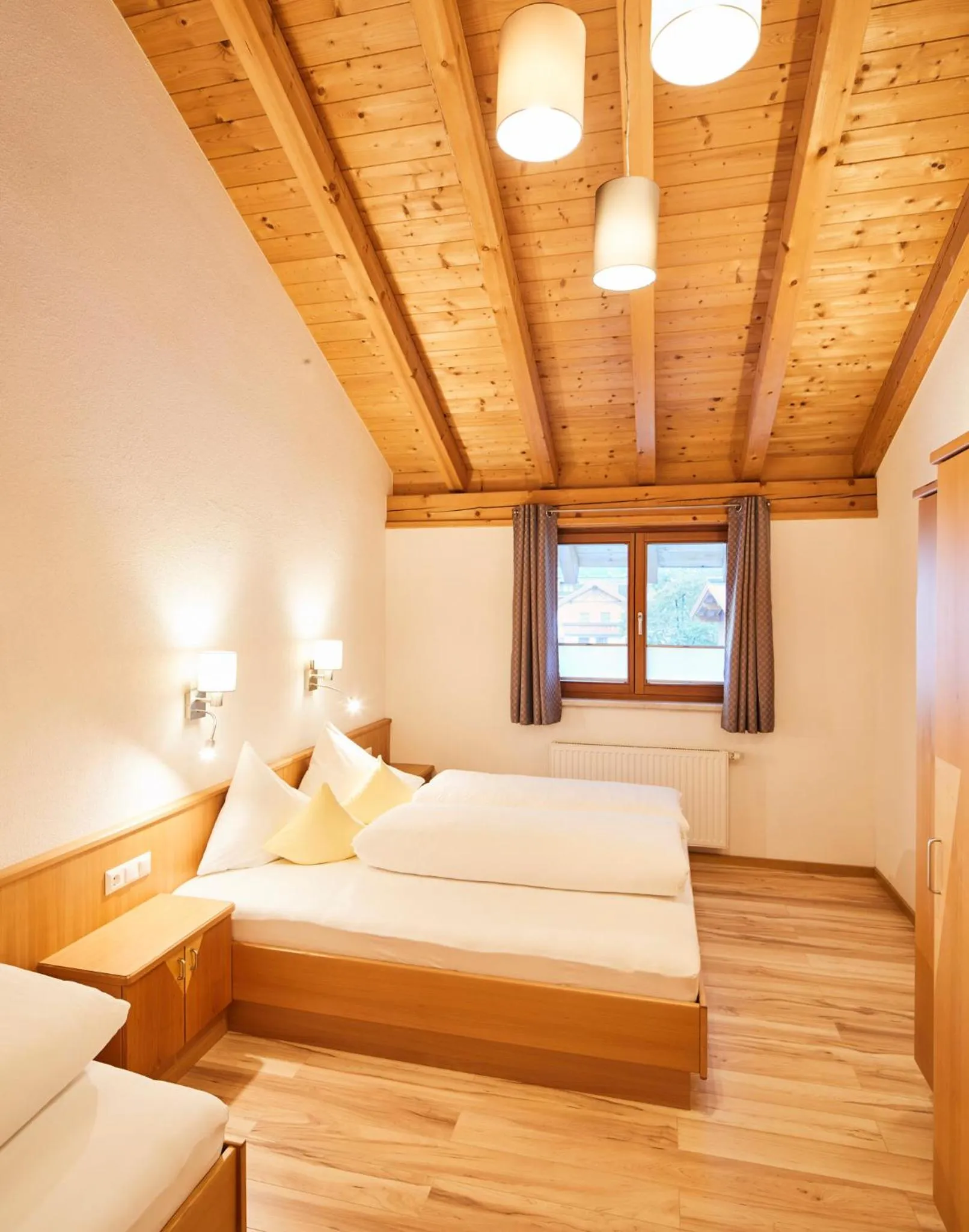 Bedroom, Bed in Tirolerhof - Appartementhaus