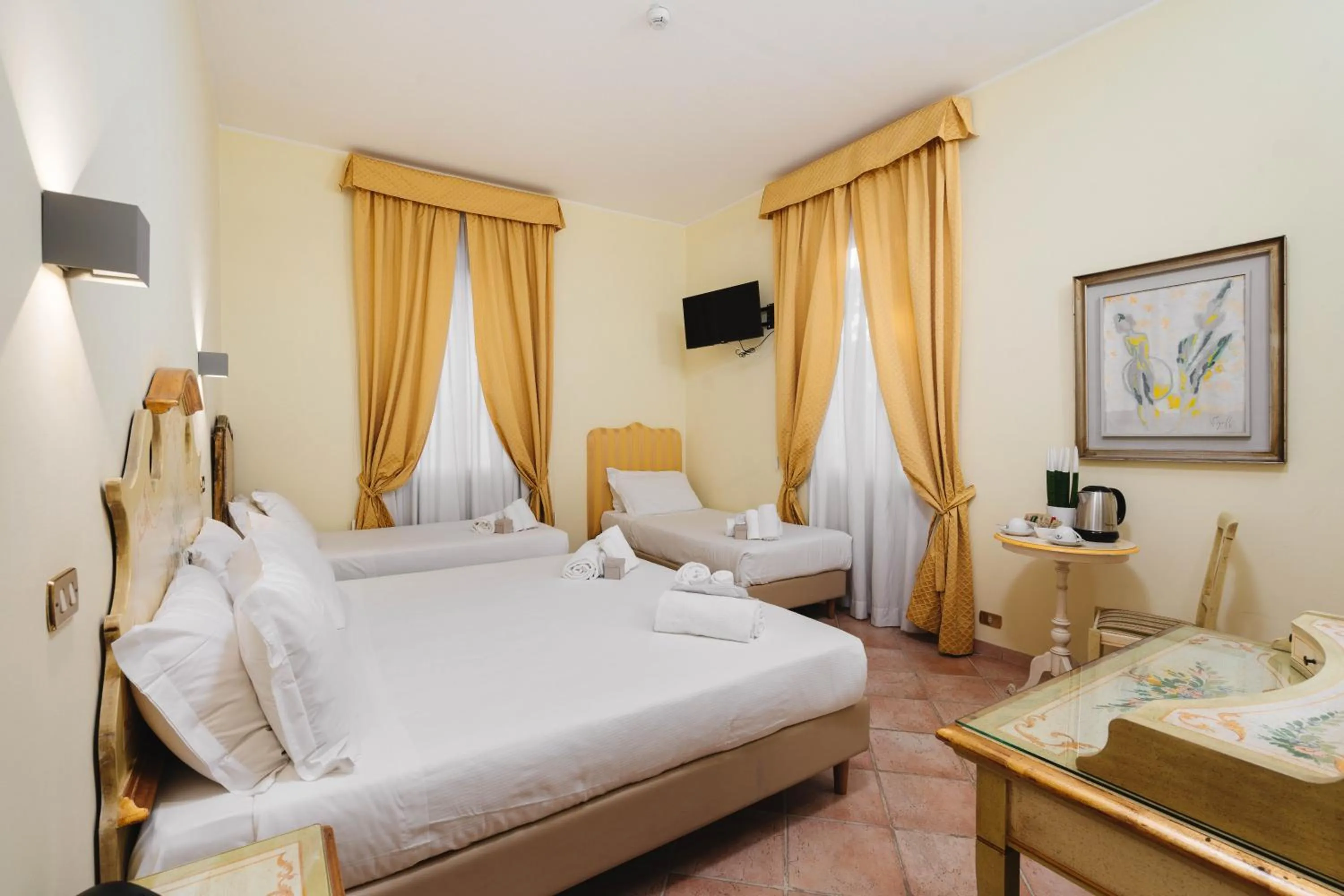 Bed in Sourire Hotel