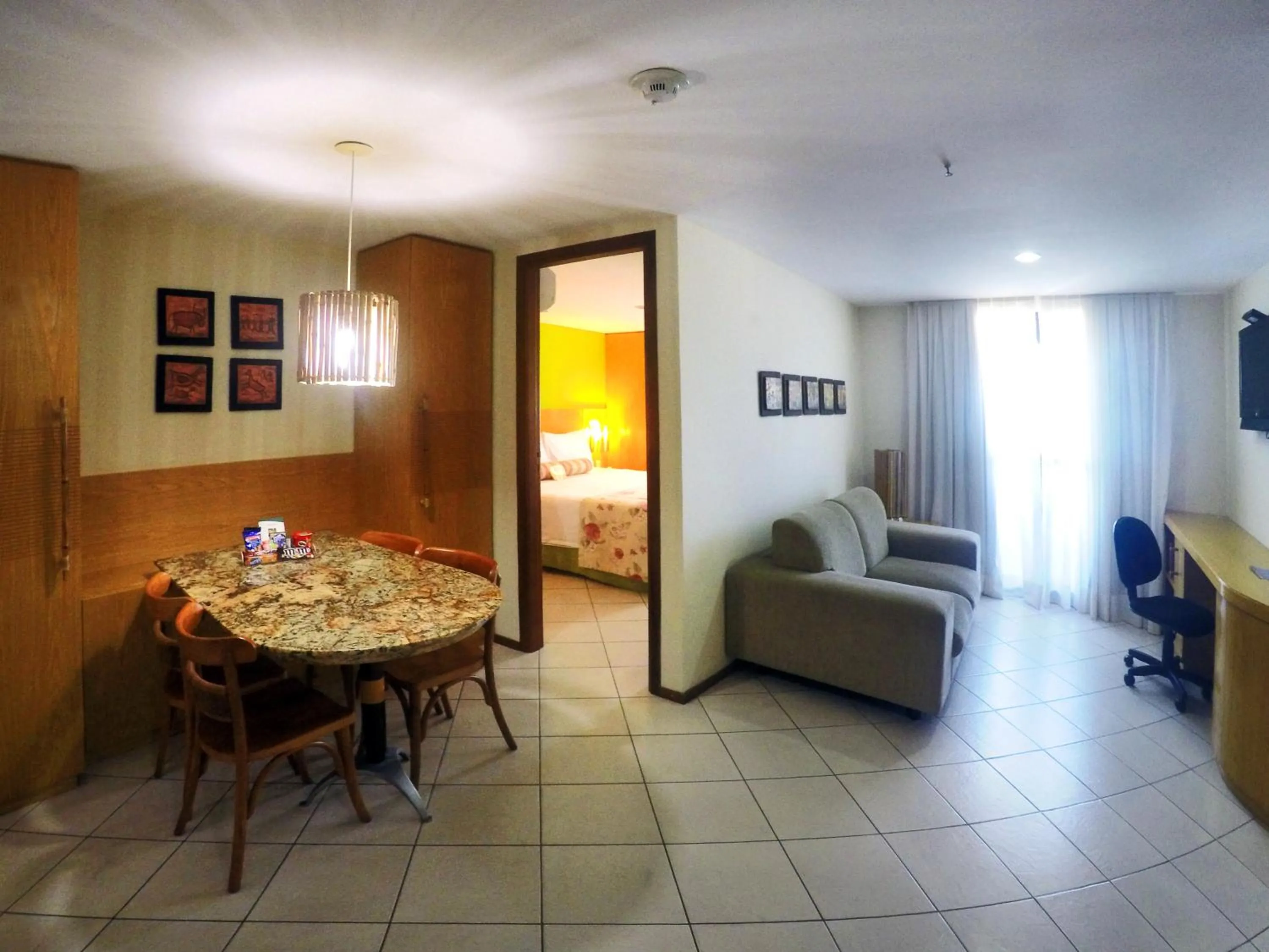 Living room, Bed in Quality Suites Natal