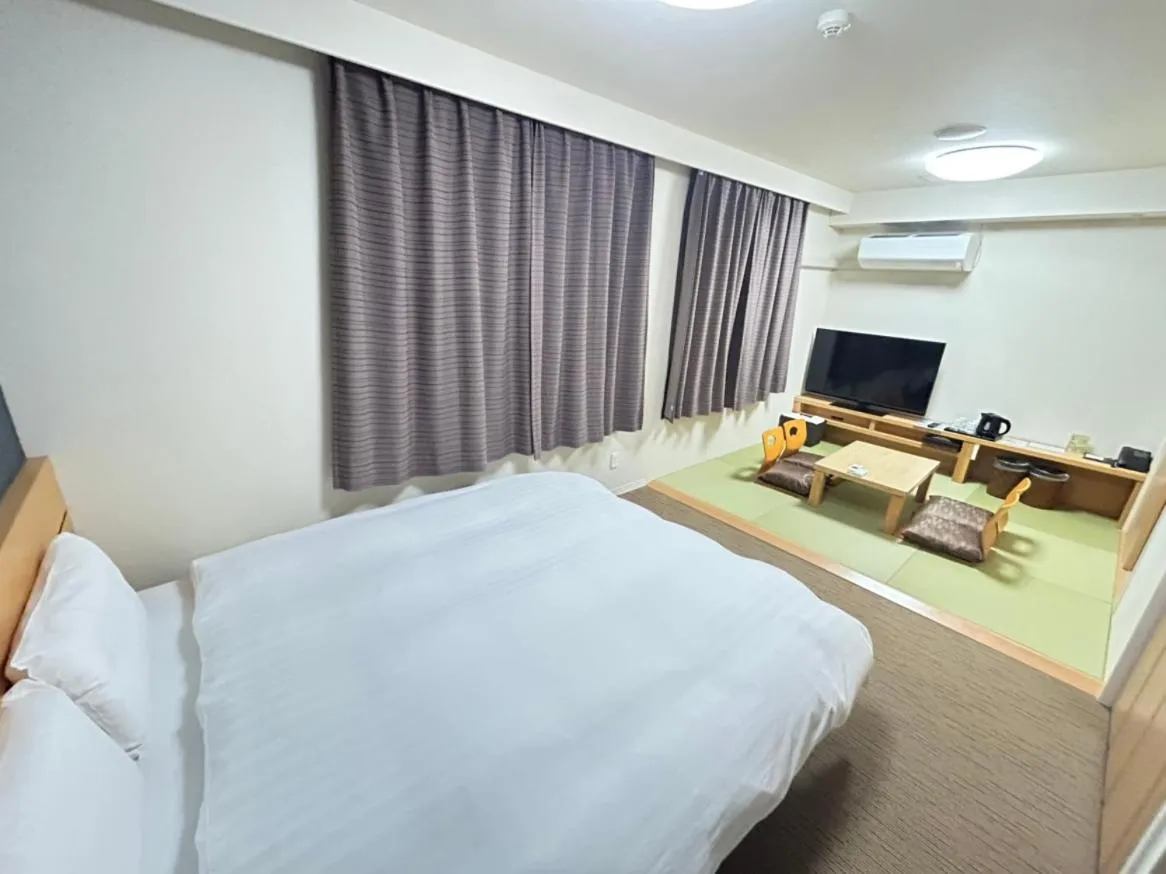 Bed in Dormy Inn Akita