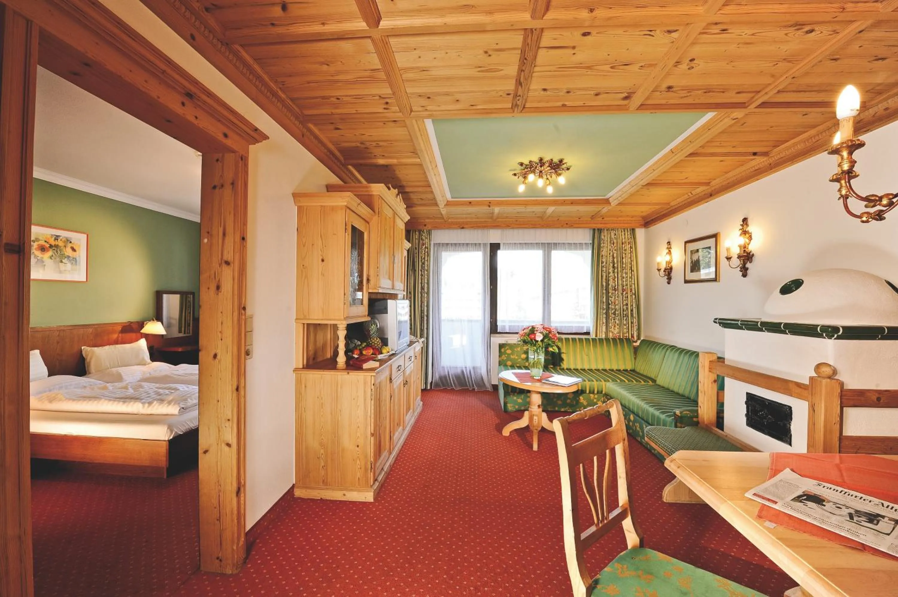 Living room, Bed in Das Kaltschmid - Familotel Tirol