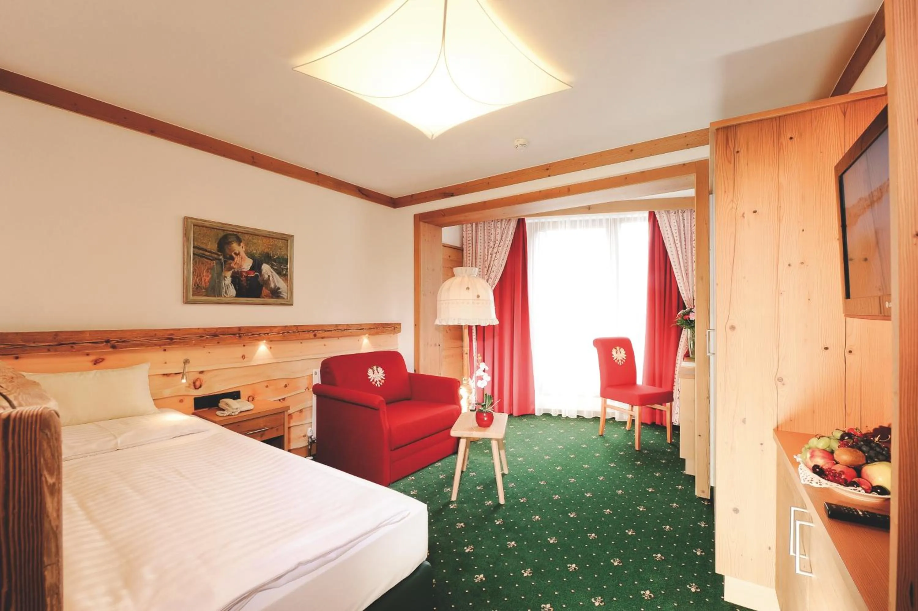 Photo of the whole room, Bed in Das Kaltschmid - Familotel Tirol