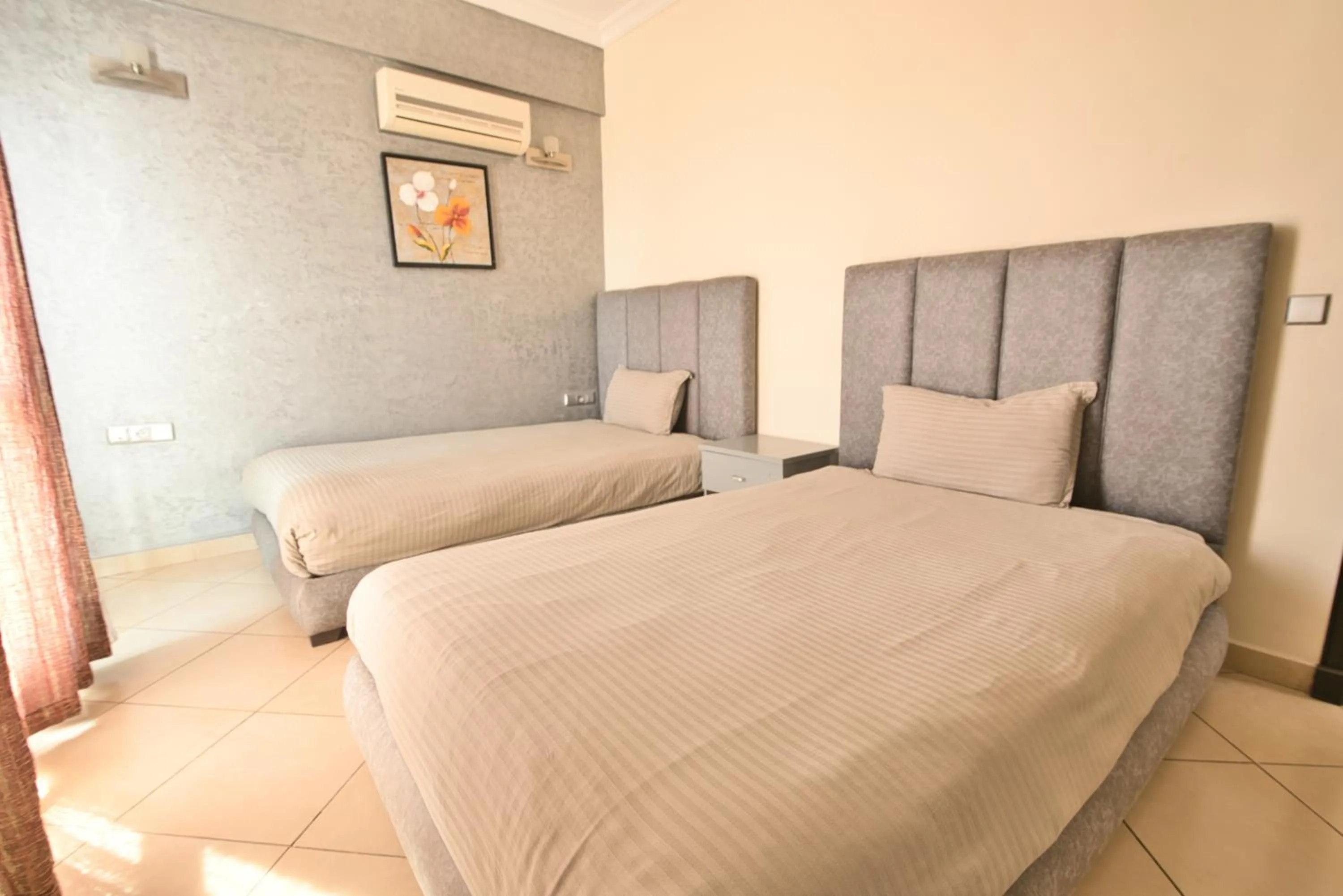 Bedroom, Bed in Appart Hôtel Founty Beach