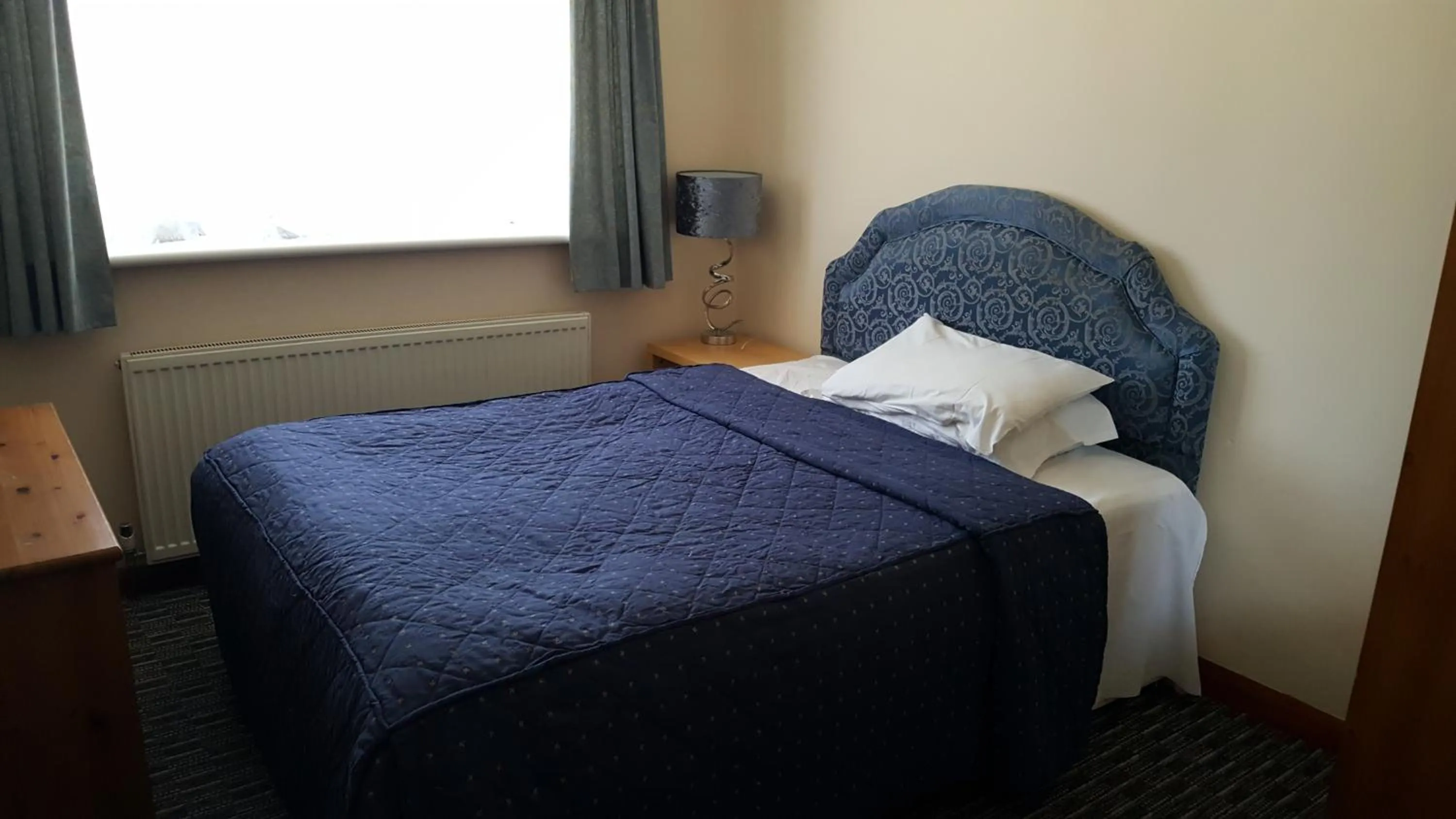 Bed in Airport Guest House