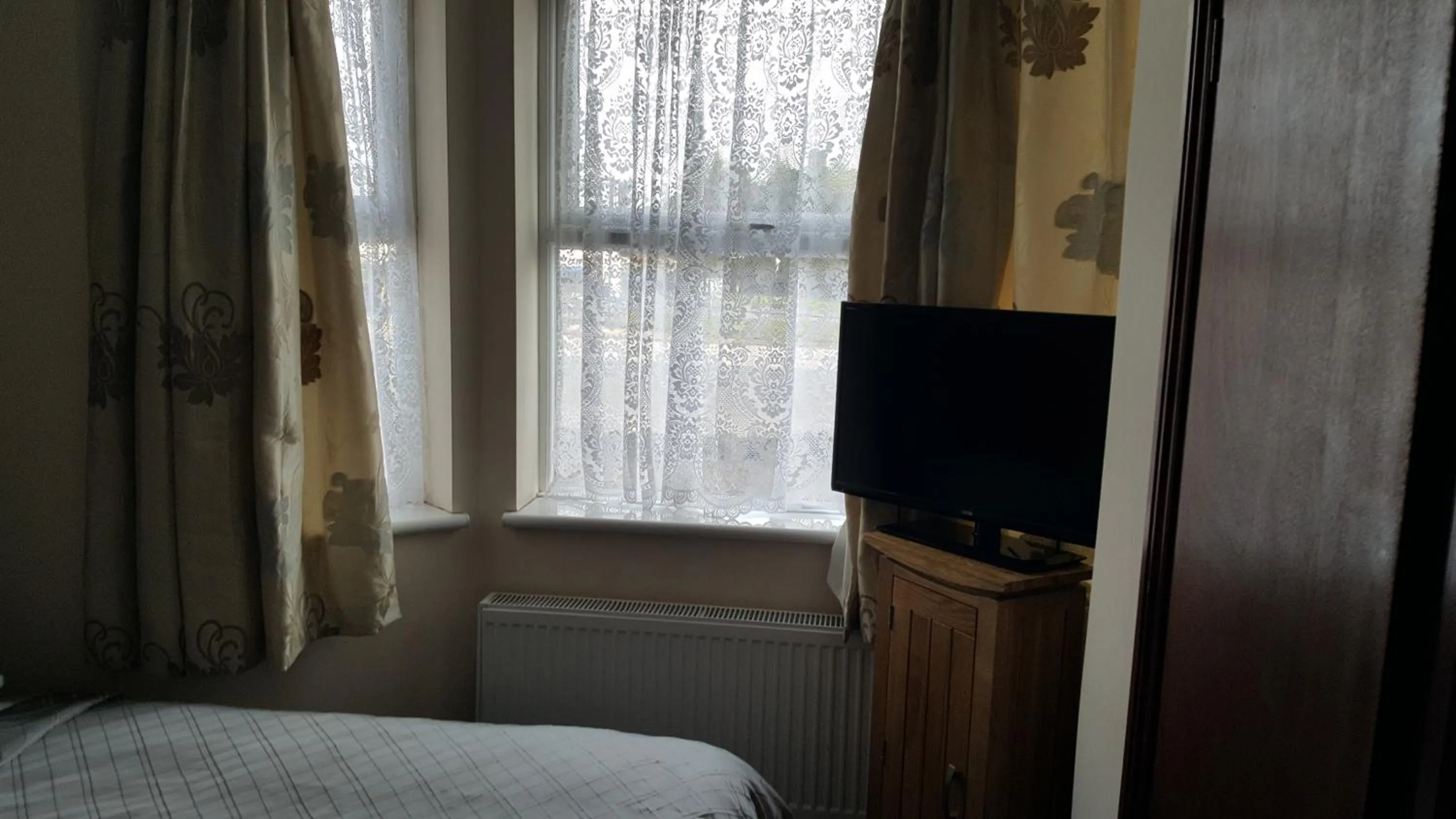 Bed in Airport Guest House