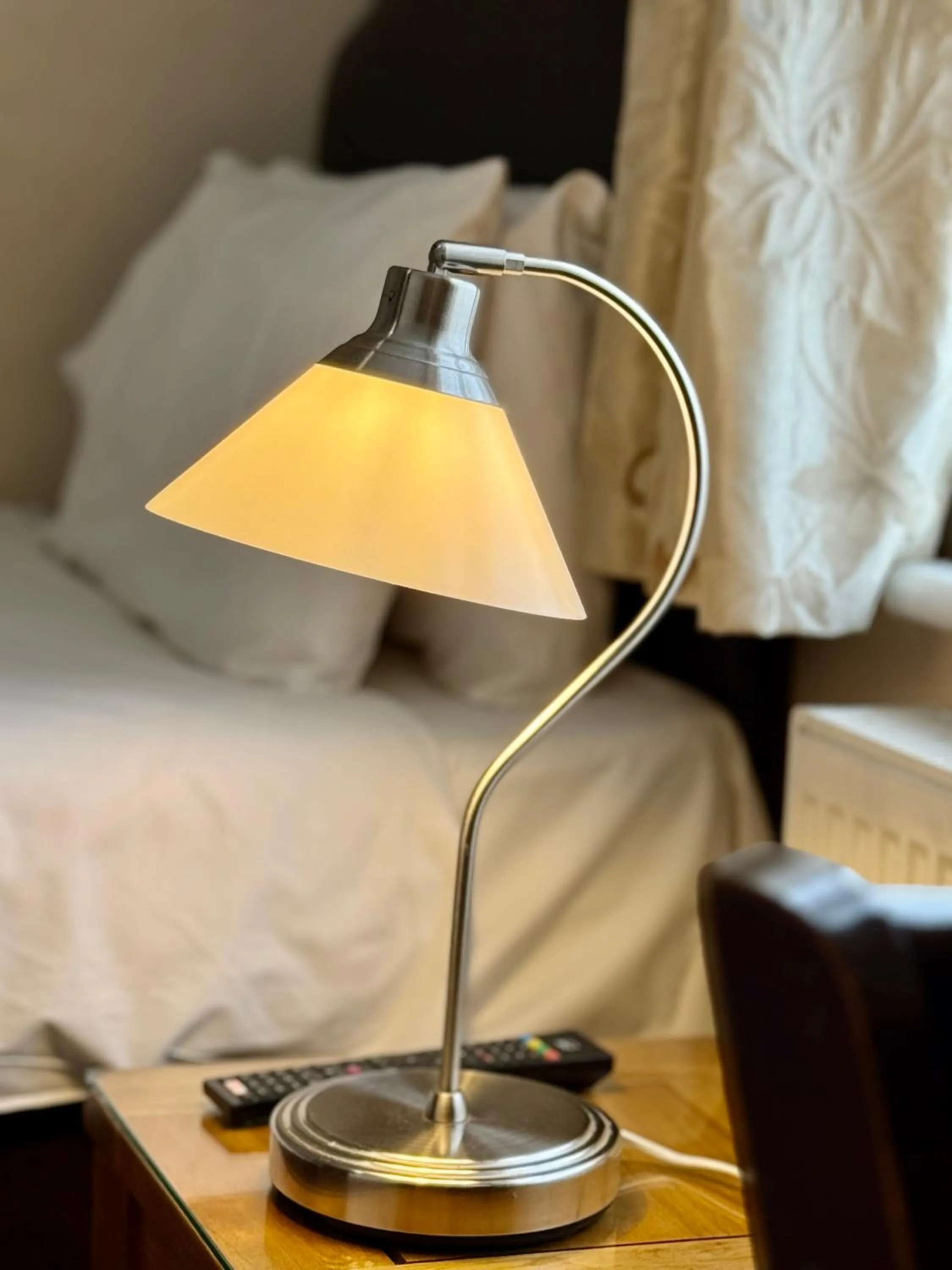 Photo of the whole room, Bed in Airport Guest House