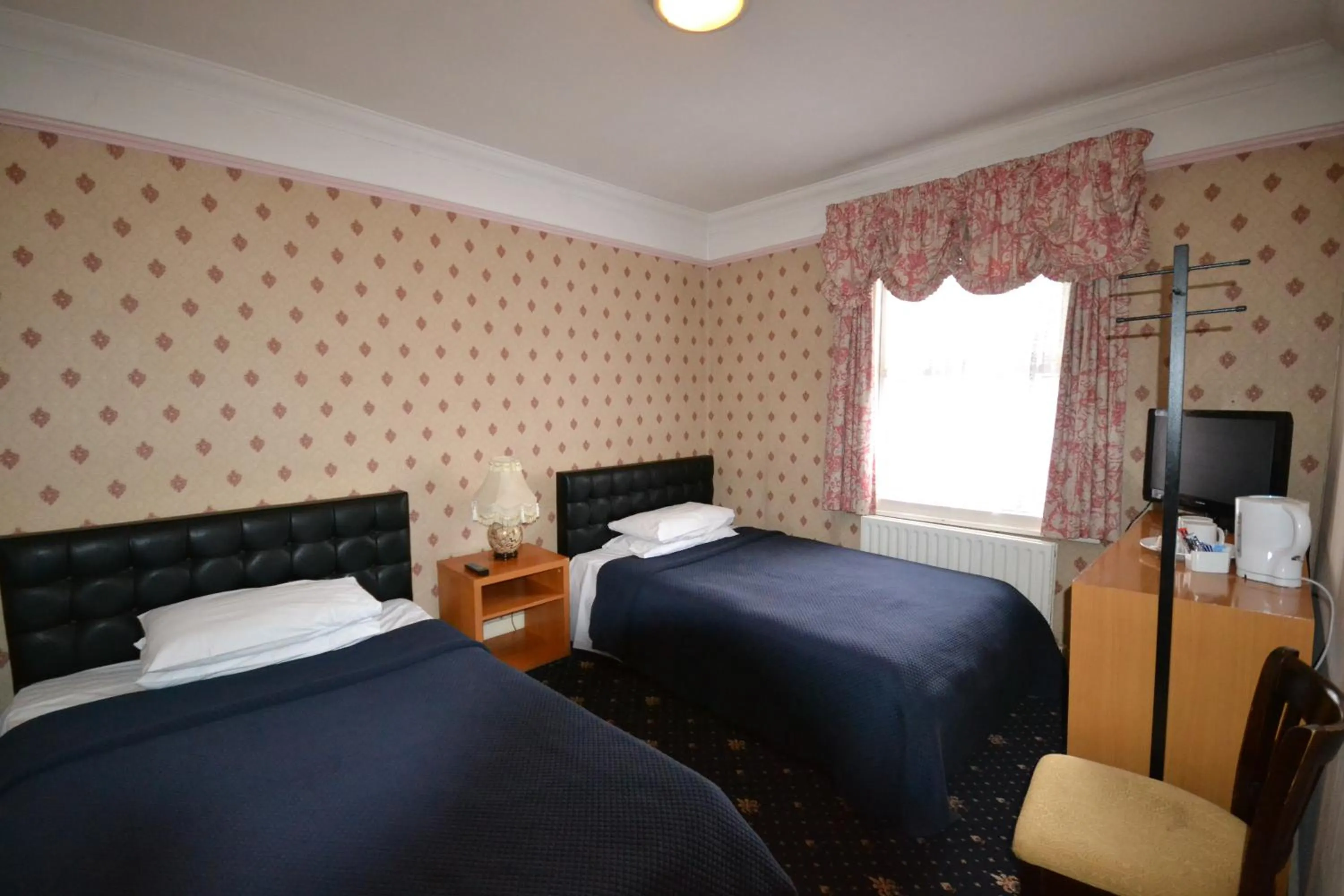 Bed in Airport Guest House