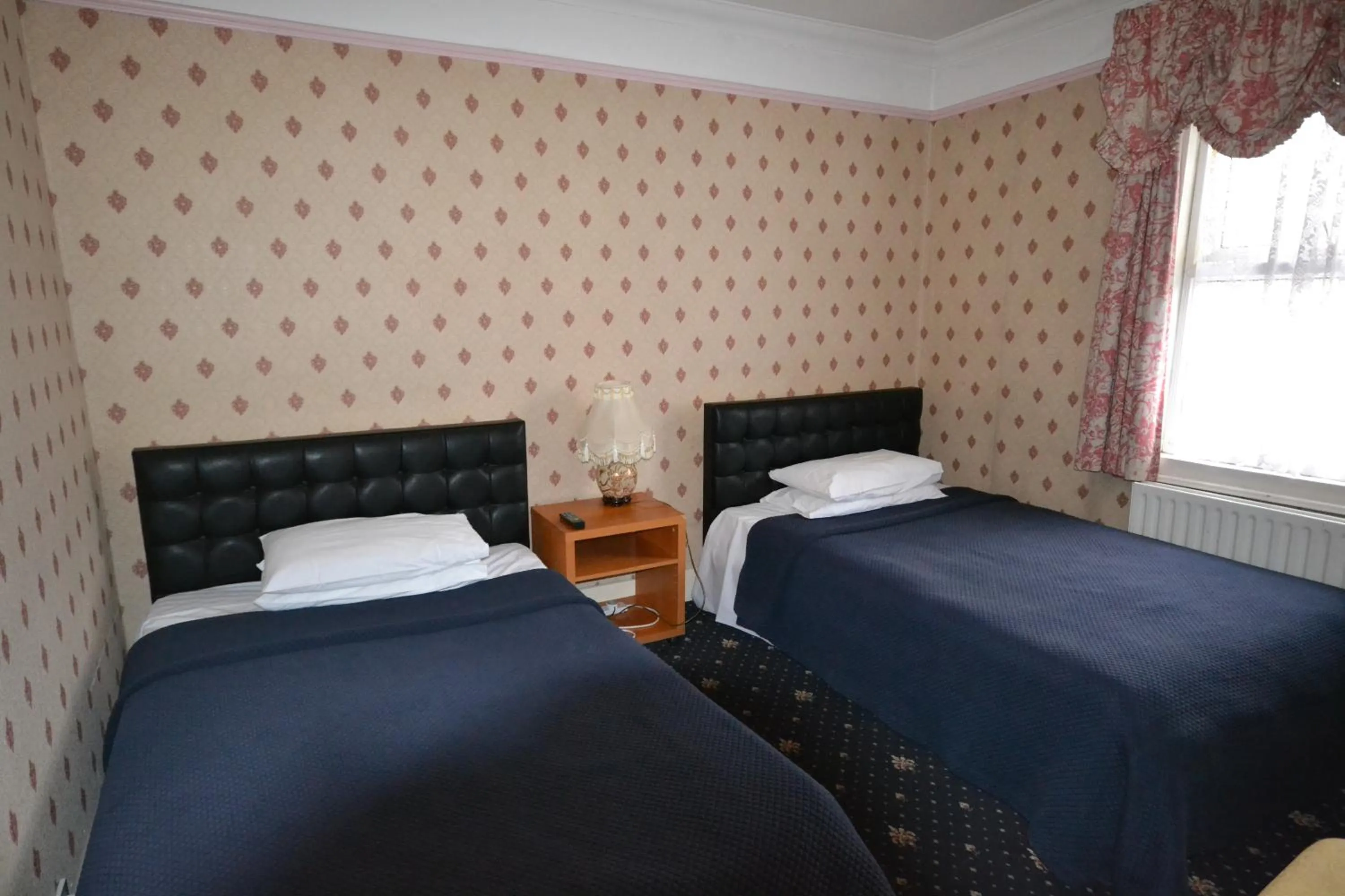 Bed in Airport Guest House