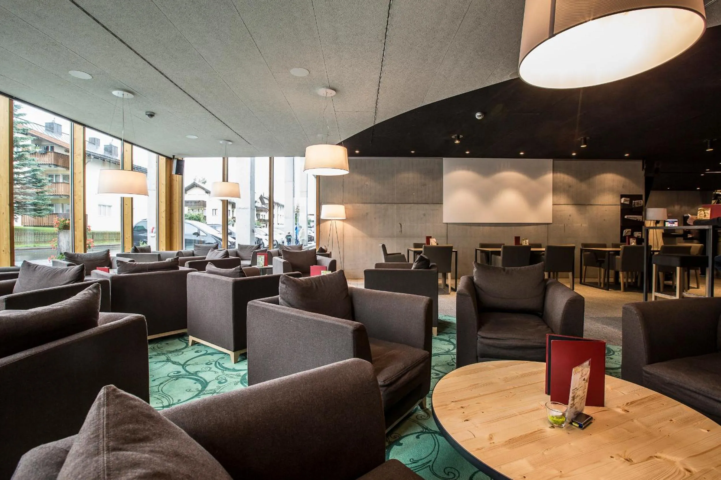 Communal lounge/ TV room in All In One Hotel - Inn Lodge / Swiss Lodge