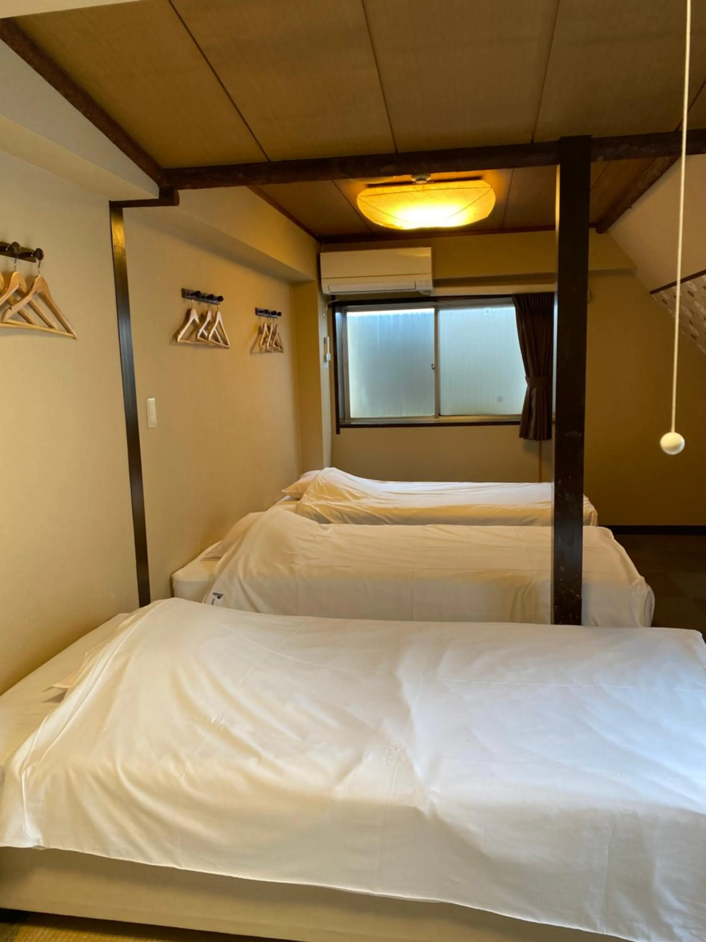 Photo of the whole room, Bed in Oyado Cocochi