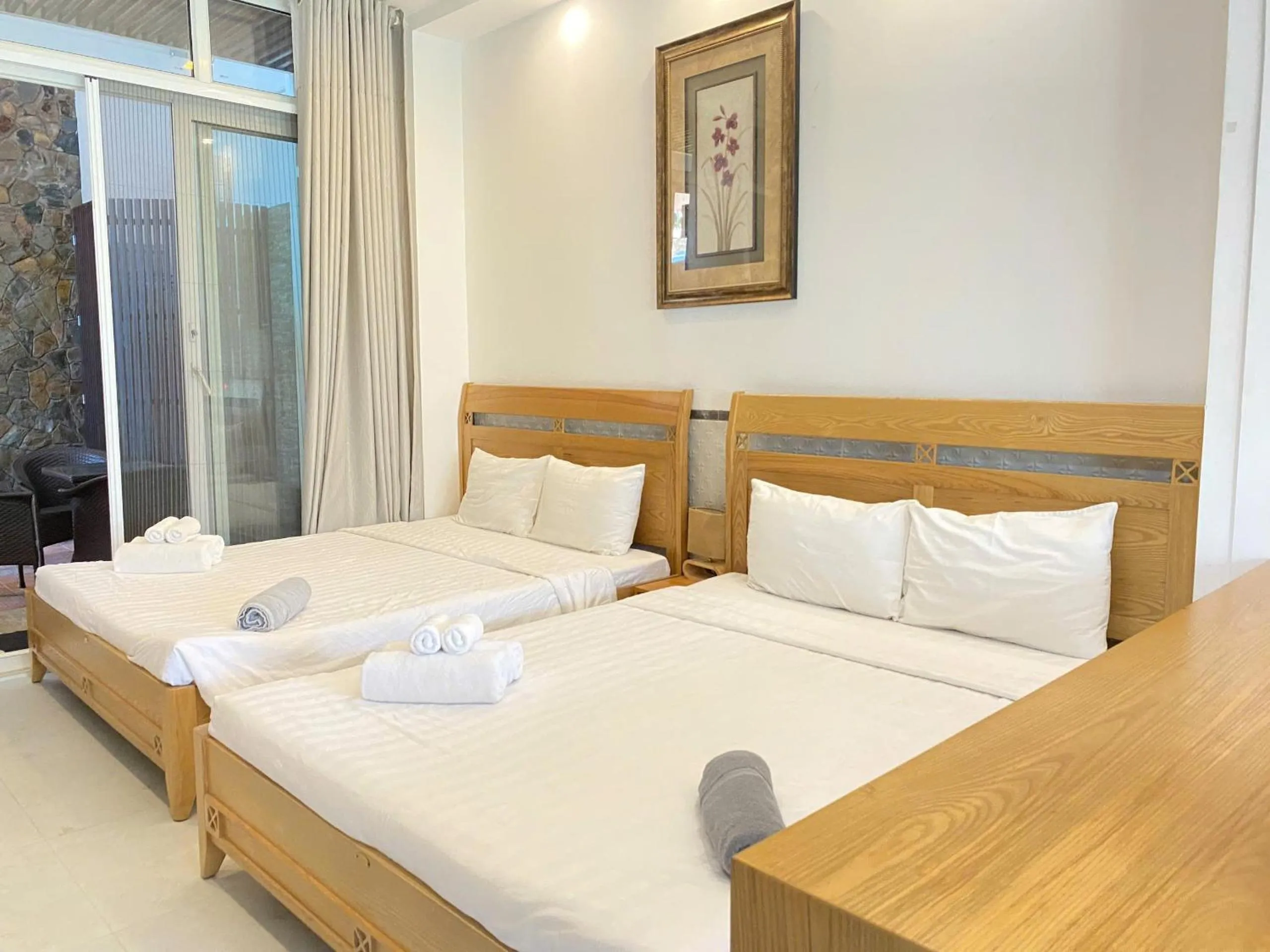 Bed in Qli Hotel Muine