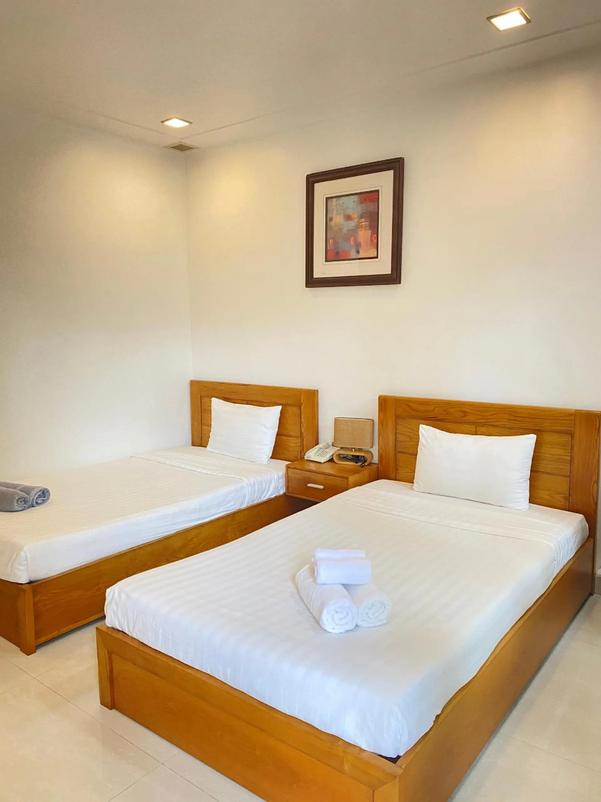 Bed in Qli Hotel Muine