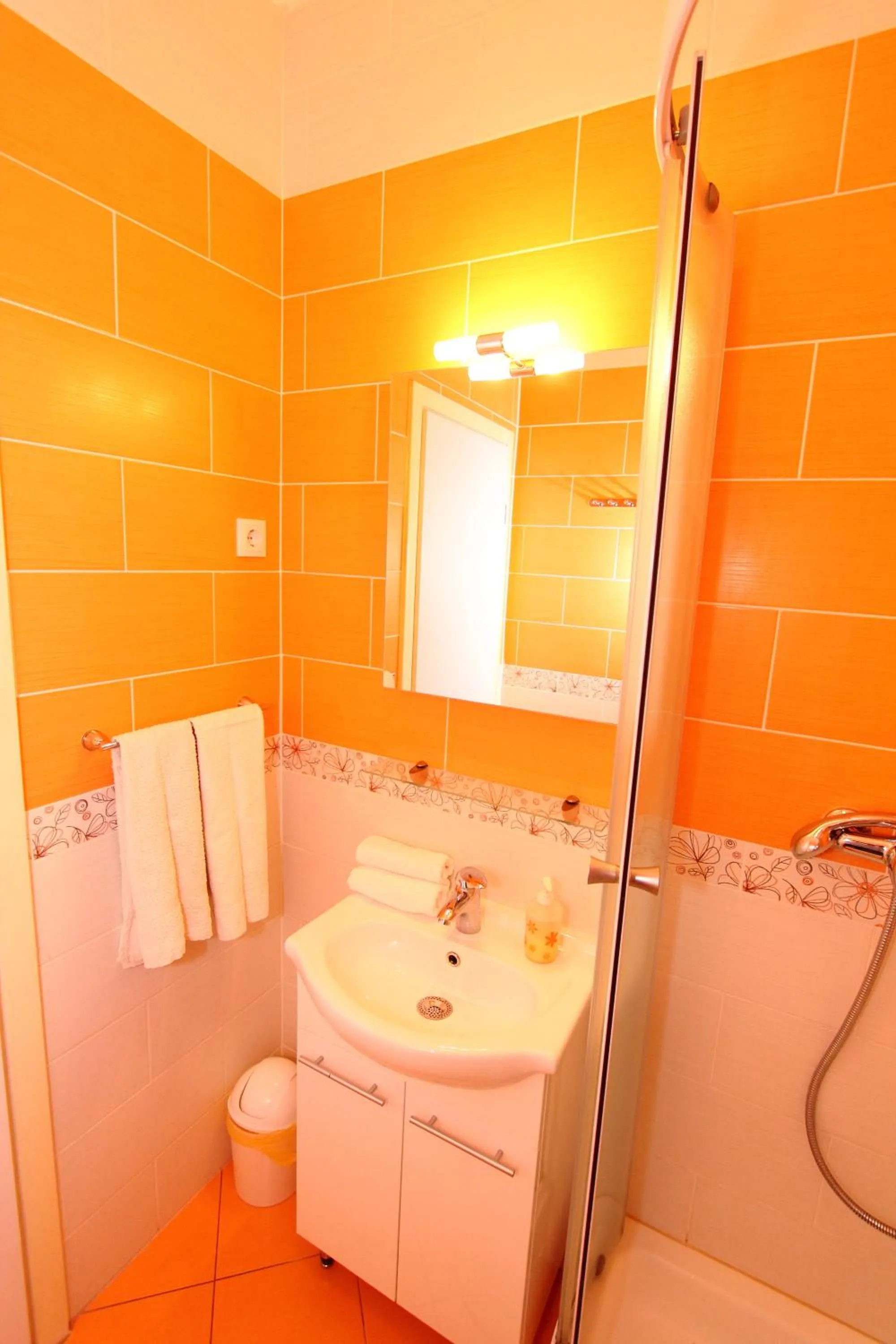 Bathroom in Nirvana Rooms & Apartments