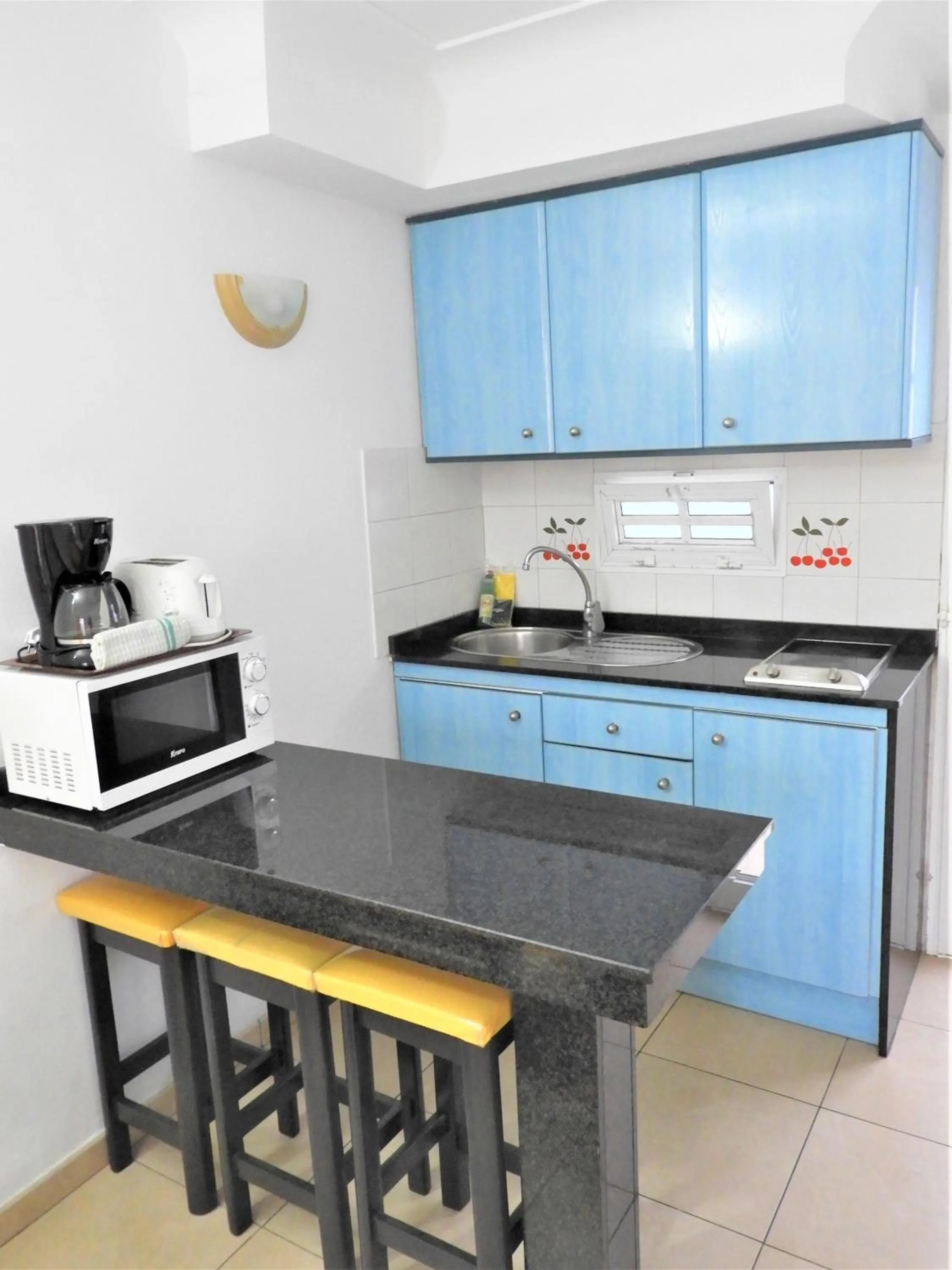 Kitchen or kitchenette in Bungalows Parque Nogal