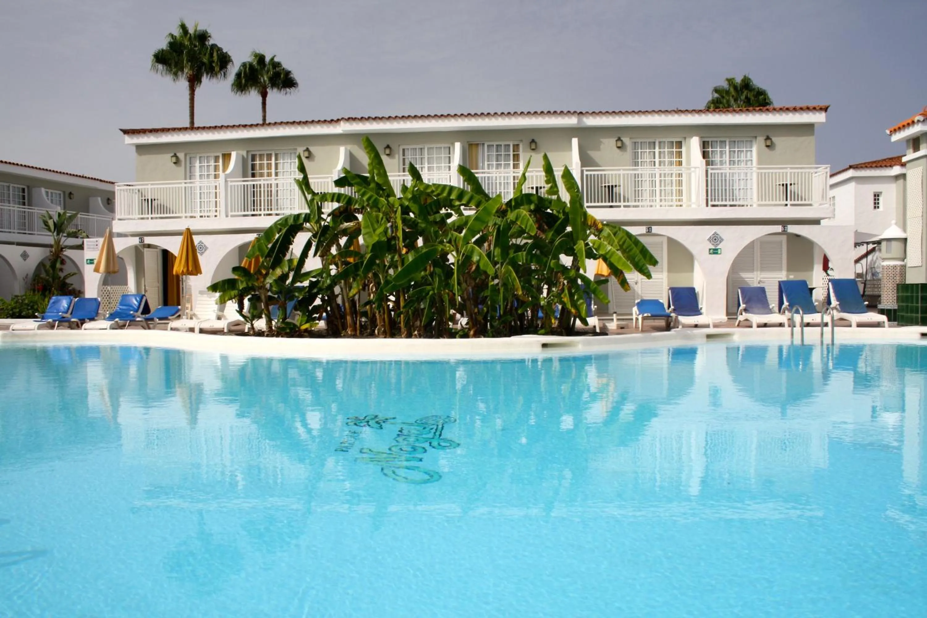 Pool view in Bungalows Parque Nogal