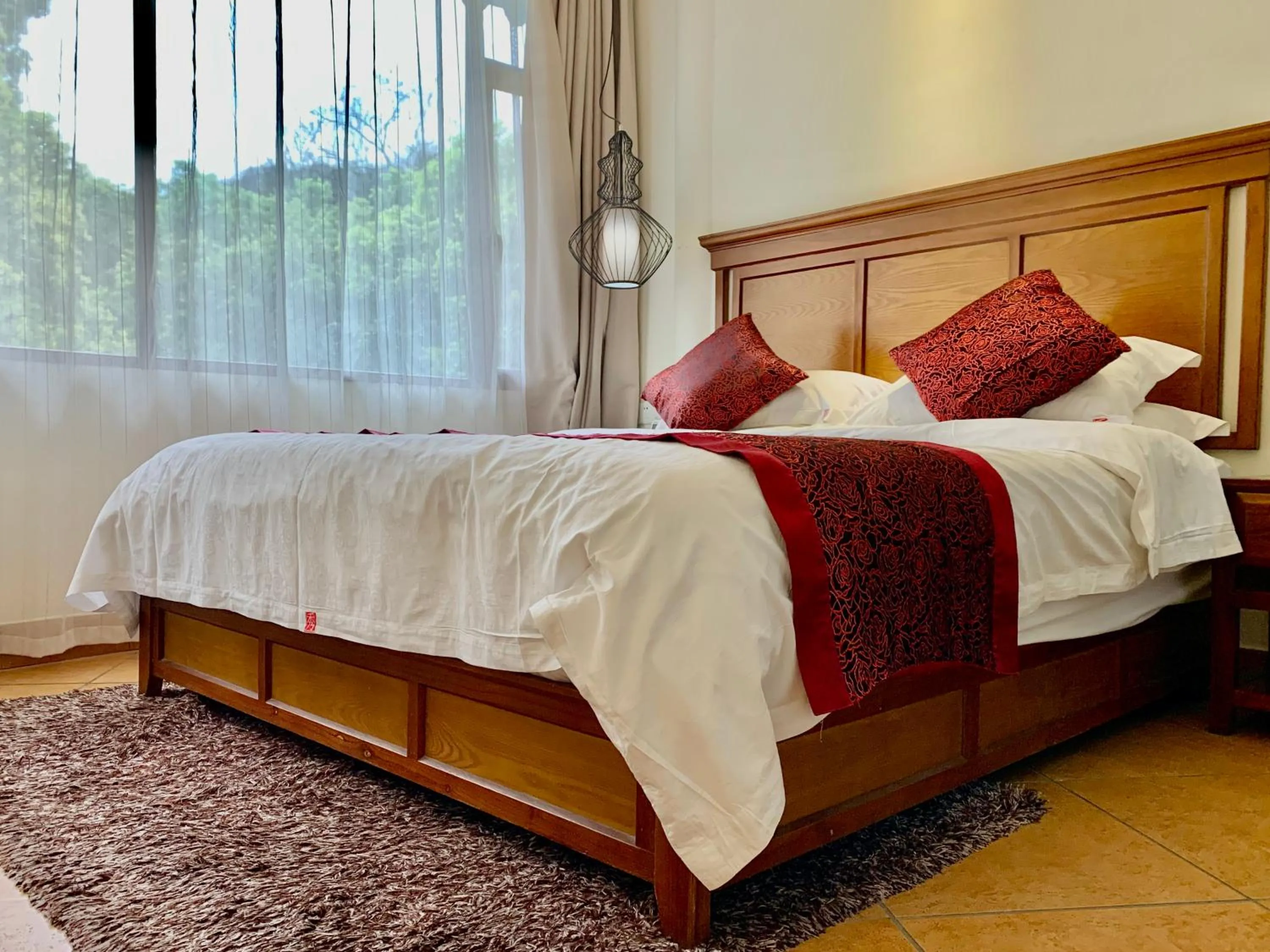 Bed in Guilin Crystal Crescent Moon Hotel