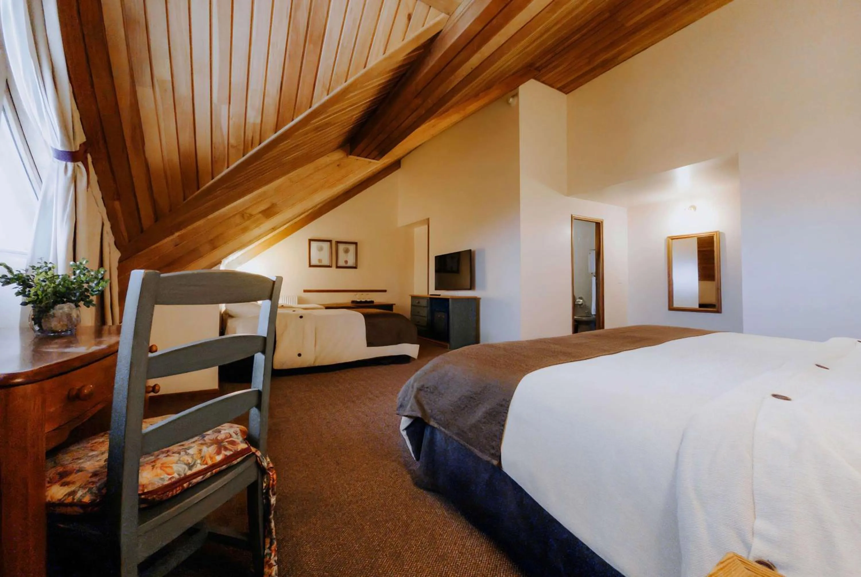 Photo of the whole room, Bed in Wyndham Garden Ushuaia Hotel del Glaciar