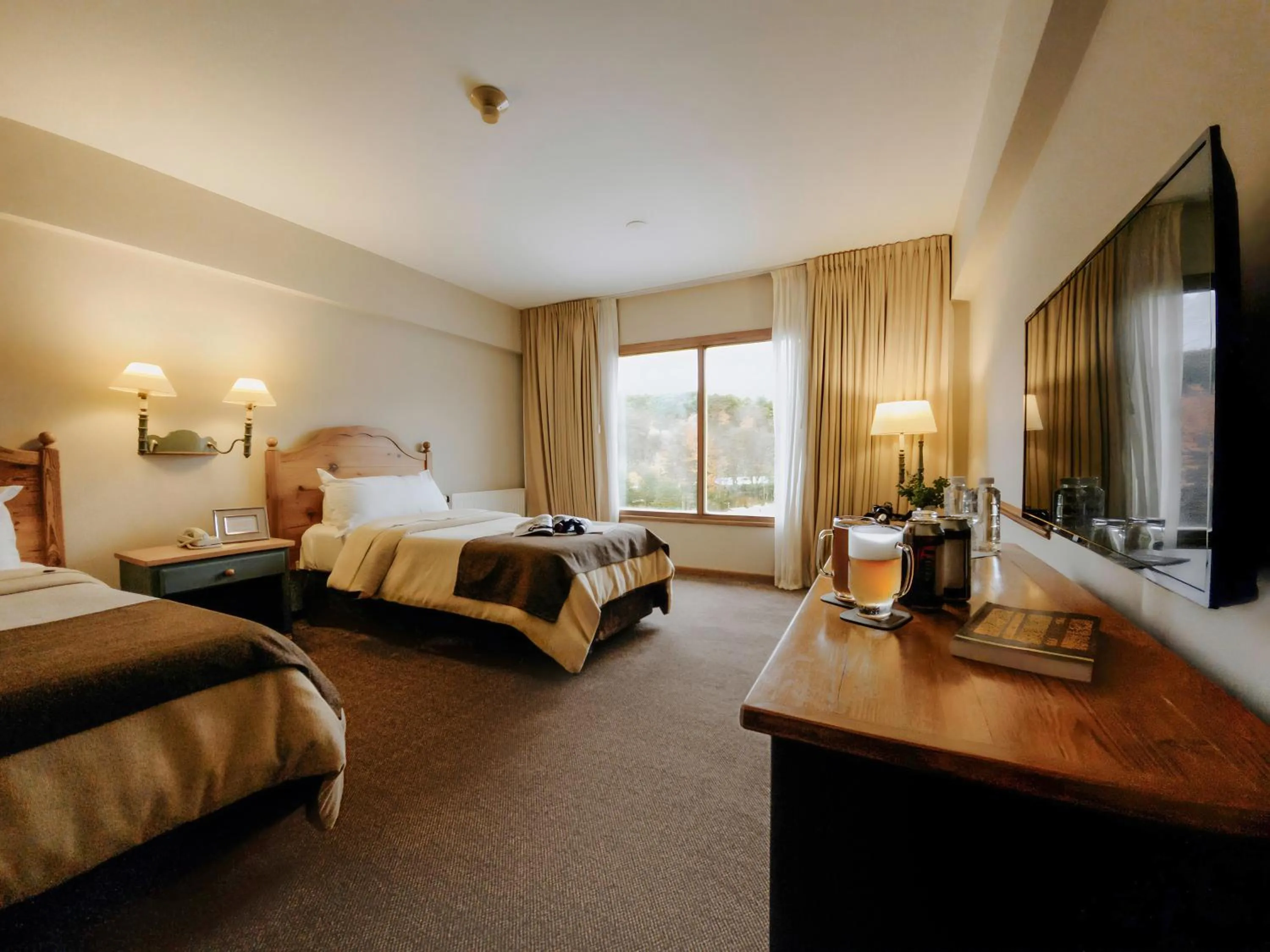 Photo of the whole room, Bed in Wyndham Garden Ushuaia Hotel del Glaciar