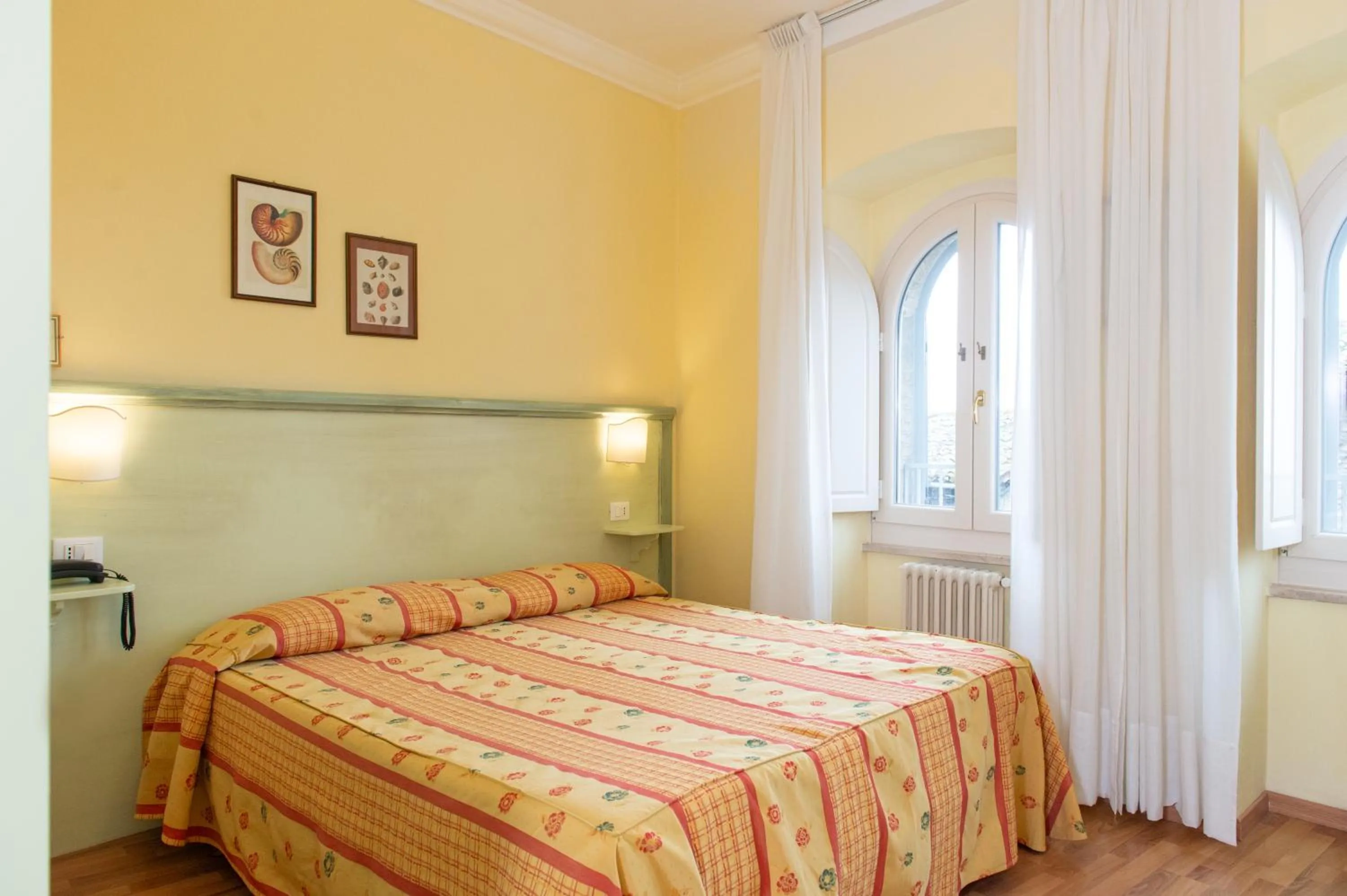 Bed in Hotel Minerva