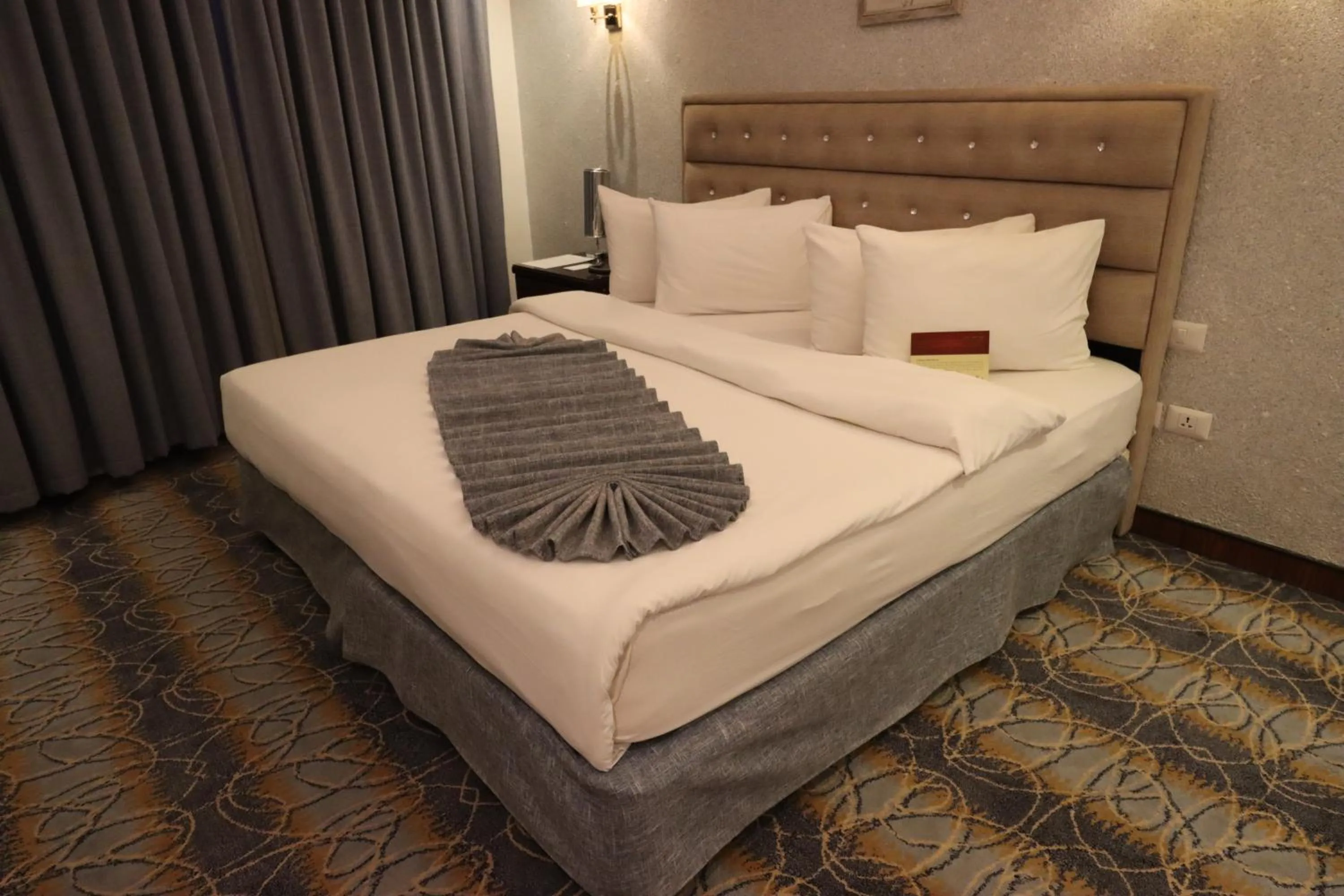 Bed in Larsa Hotel