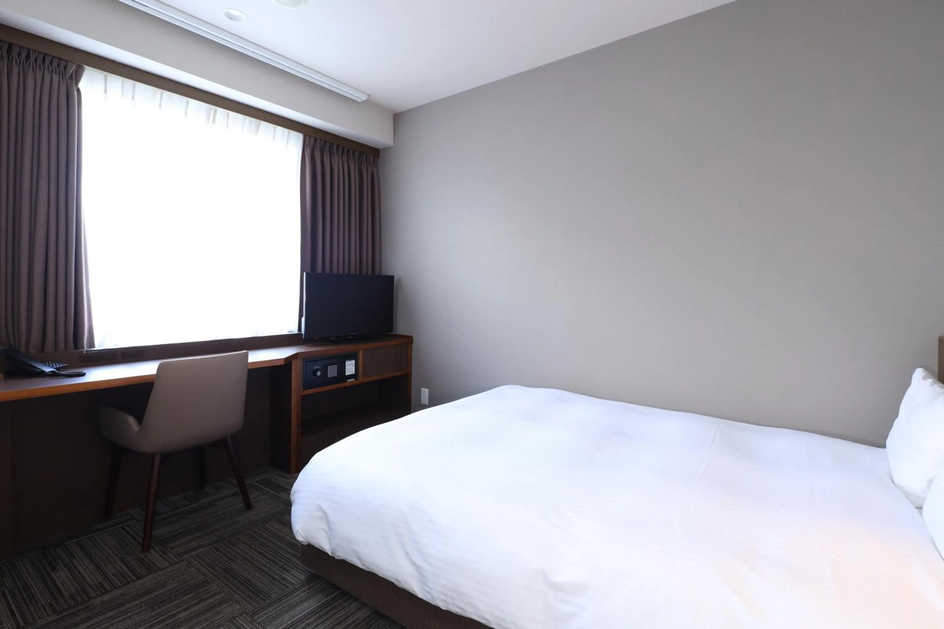 Photo of the whole room, Bed in Dormy Inn Chiba City Soga