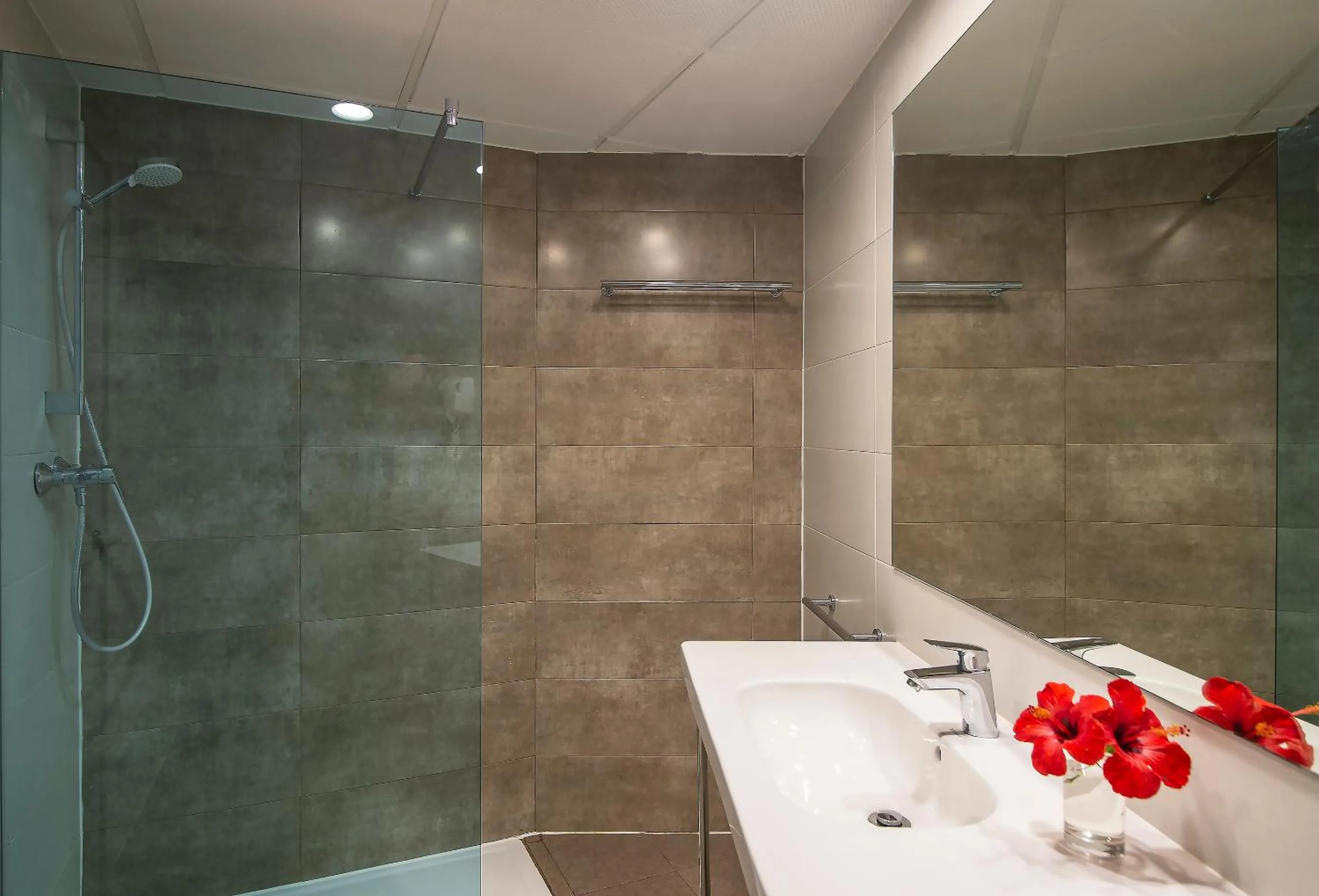 Bathroom in Hotel Roquetas El Palmeral by Pierre & Vacances