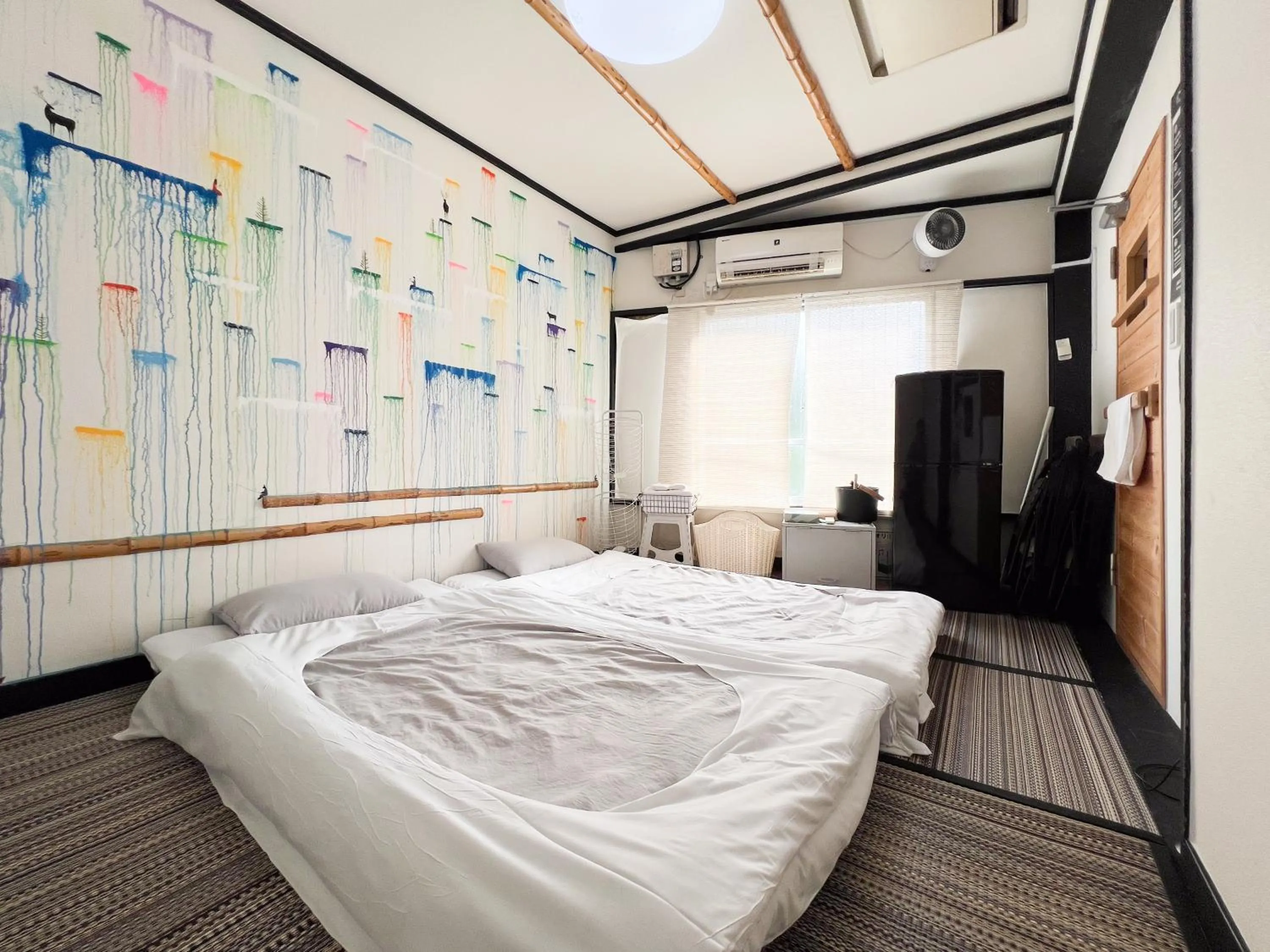 Bed in Tokyo Guest House Ouji Music Lounge